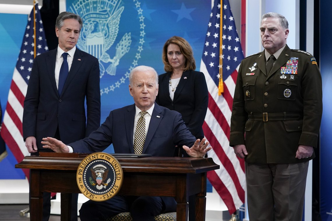 President Joe Biden speaks after signing a delegation of authority in the South Court Auditorium on the White House campus in Washington, Wednesday, March 16, 2022. From left, Secretary of State Antony Blinken, Biden, Deputy Secretary of Defense Kathleen Hicks and Chairman of the Joint Chiefs of Staff General Mark Milley. (AP Photo/Patrick Semansky) President Joe Biden speaks after signing a delegation of authority in the South Court Auditorium on the White House campus in Washington, Wednesday, March 16, 2022. From left, Secretary of State Antony Blinken, Biden, Deputy Secretary of Defense Kathleen Hicks and Chairman of the Joint Chiefs of Staff General Mark Milley. (AP Photo/Patrick Semansky)