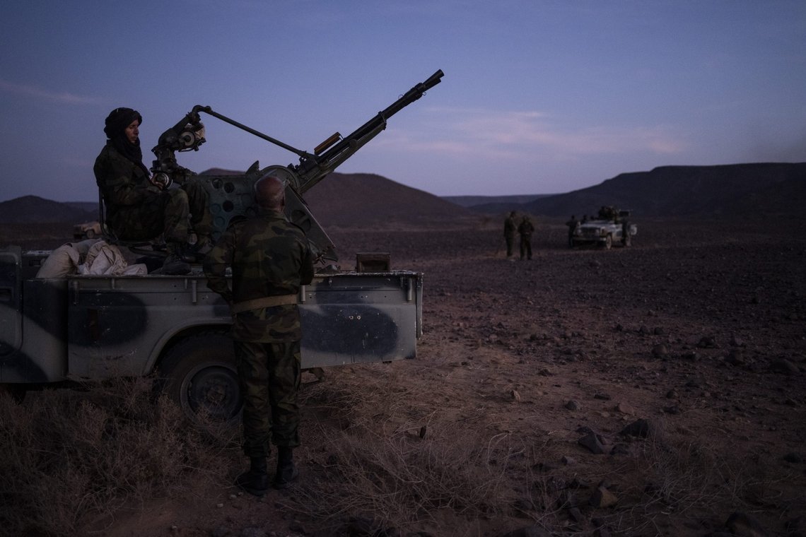 FILE - Polisario Front soldiers talk during a shooting exercise, near Mehaires, Western Sahara, Wednesday, Oct. 13, 2021. Morocco’s royal palace says that Spain’s prime minister has told the Moroccan king that a proposal for establishing an autonomous Western Sahara under Rabat’s rule is “the most serious, realistic and credible” initiative for resolving a decades-long dispute over the vast territory. The palace says Friday, March 18, 2021 that, in a letter to King Mohammed VI, Prime Minister Pedro Sánchez recognized “the importance of the Sahara issue for Morocco” and that “Spain considers the autonomy initiative presented by Morocco in 2007, as the basis, the most serious, realistic and credible, for resolving the dispute." (AP Photo/Bernat Armangue, File) FILE - Polisario Front soldiers talk during a shooting exercise, near Mehaires, Western Sahara, Wednesday, Oct. 13, 2021. Morocco’s royal palace says that Spain’s prime minister has told the Moroccan king that a proposal for establishing an autonomous Western Sahara under Rabat’s rule is “the most serious, realistic and credible” initiative for resolving a decades-long dispute over the vast territory. The palace says Friday, March 18, 2021 that, in a letter to King Mohammed VI, Prime Minister Pedro Sánchez recognized “the importance of the Sahara issue for Morocco” and that “Spain considers the autonomy initiative presented by Morocco in 2007, as the basis, the most serious, realistic and credible, for resolving the dispute." (AP Photo/Bernat Armangue, File)