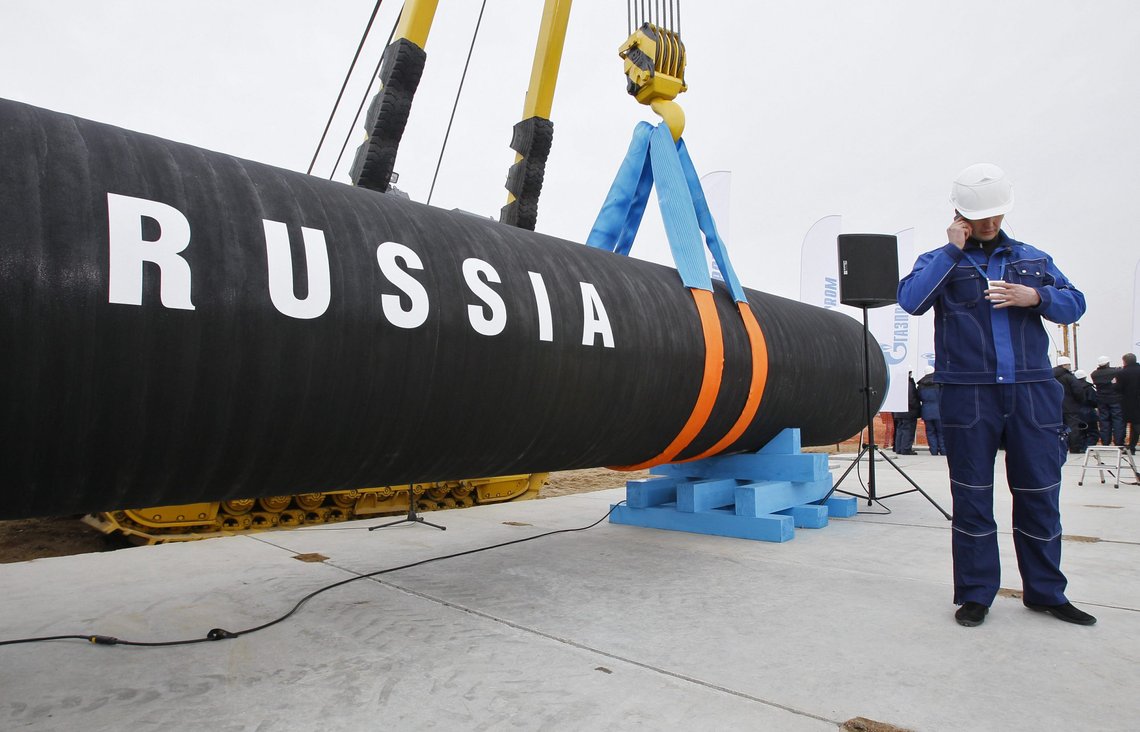 FILE - A Russian construction worker speaks on a mobile phone during a ceremony marking the start of Nord Stream pipeline construction in Portovaya Bay some 170 kms (106 miles) north-west from St. Petersburg, Russia on April 9, 2010. Surging energy prices and fear of a Russian invasion of Ukraine are making European leaders think hard about energy security — particularly their decades-old reliance on Moscow for natural gas. (AP Photo/Dmitry Lovetsky, File) FILE - A Russian construction worker speaks on a mobile phone during a ceremony marking the start of Nord Stream pipeline construction in Portovaya Bay some 170 kms (106 miles) north-west from St. Petersburg, Russia on April 9, 2010. Surging energy prices and fear of a Russian invasion of Ukraine are making European leaders think hard about energy security — particularly their decades-old reliance on Moscow for natural gas. (AP Photo/Dmitry Lovetsky, File)