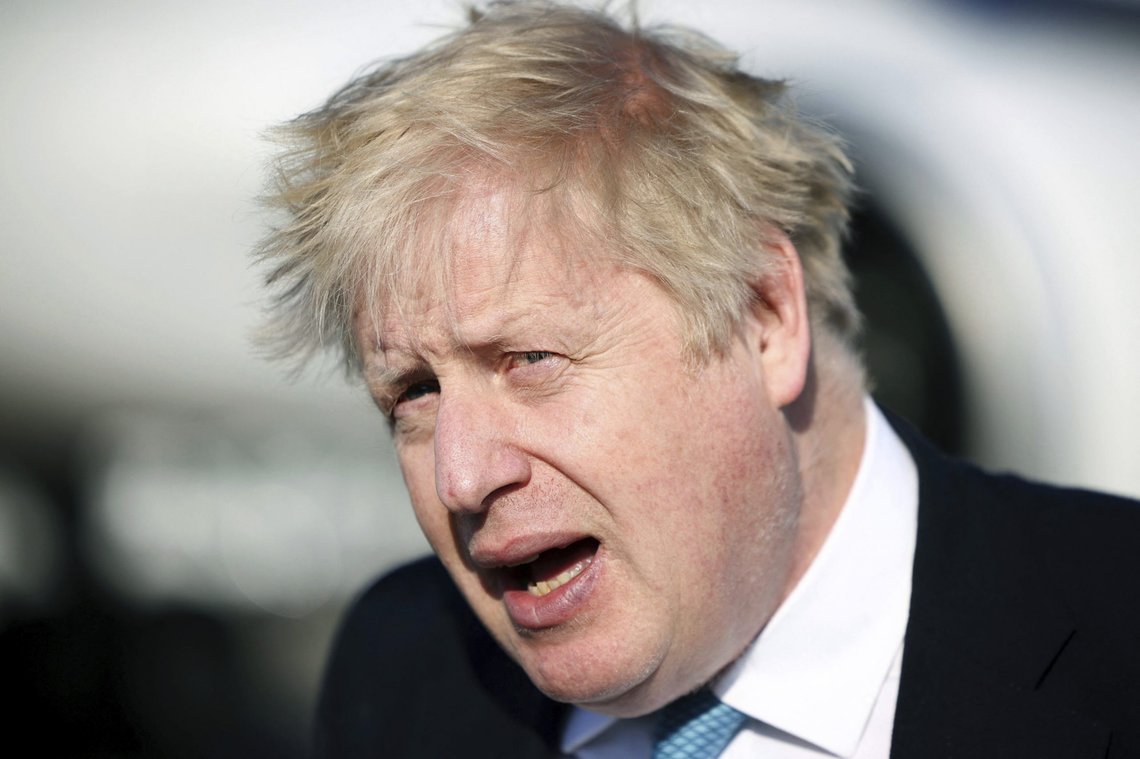 Britain's Prime Minister Boris Johnson adresses the media as he arrives to attend a special meeting of NATO leaders in Brussels, Belgium, Thursday March 24, 2022. Western leaders are arriving in Brussels for Thursday's summits taking place at NATO and EU headquarters where they will seek to highlight their sense of unity in the face of the Russian invasion in Ukraine. (Henry Nicholls/Pool Photo via AP) Britain's Prime Minister Boris Johnson adresses the media as he arrives to attend a special meeting of NATO leaders in Brussels, Belgium, Thursday March 24, 2022. Western leaders are arriving in Brussels for Thursday's summits taking place at NATO and EU headquarters where they will seek to highlight their sense of unity in the face of the Russian invasion in Ukraine. (Henry Nicholls/Pool Photo via AP)
