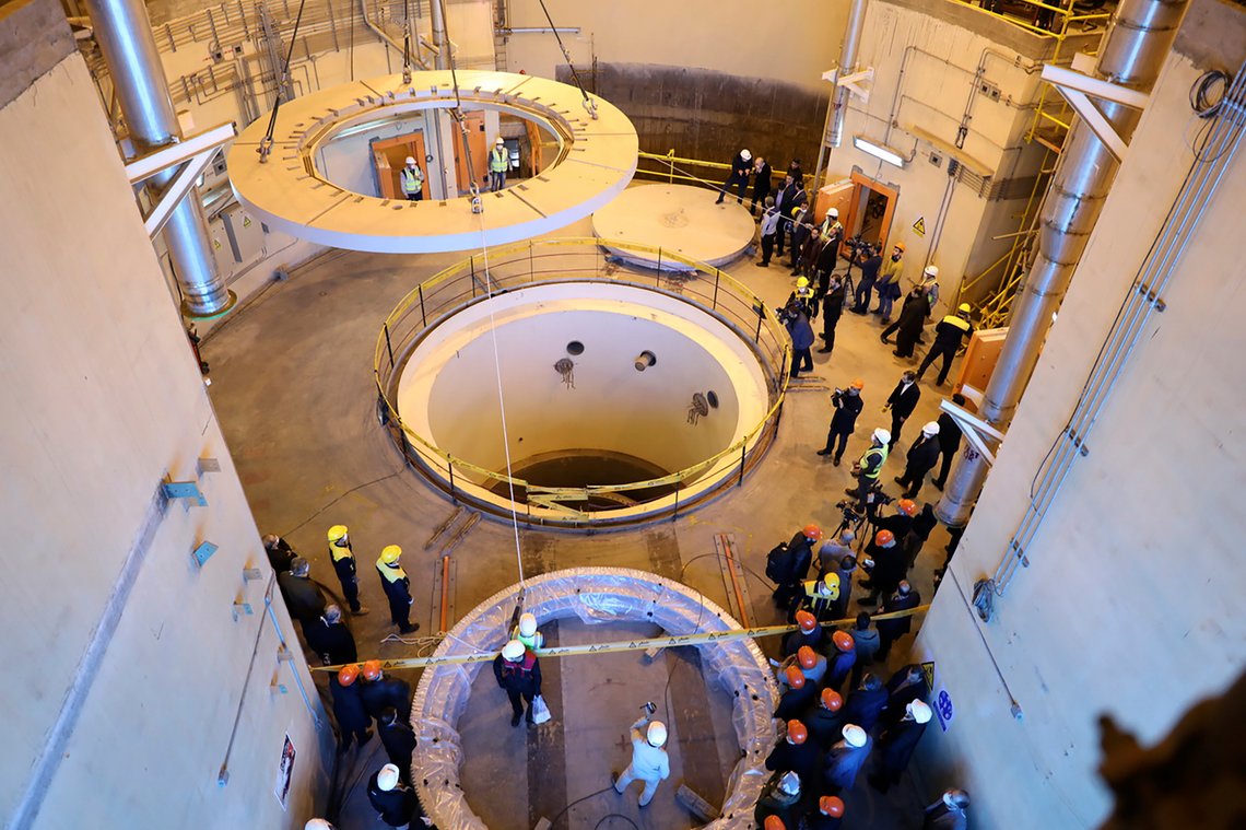 FILE—In this Dec. 23, 2019 file photo released by the Atomic Energy Organization of Iran, technicians work at the Arak heavy water reactor's secondary circuit, as officials and media visit the site, near Arak, 150 miles (250 kilometers) southwest of the capital Tehran, Iran. In a statement after a virtual meeting on Friday, April 2, 2021, the chair of a group of high-level officials from the European Union, China, France, Germany, Russia, Britain and Iran said the participants "emphasized their commitment to preserve the JCPOA and discussed modalities to ensure the return to its full and effective implementation." (Atomic Energy Organization of Iran via AP, File) FILE—In this Dec. 23, 2019 file photo released by the Atomic Energy Organization of Iran, technicians work at the Arak heavy water reactor's secondary circuit, as officials and media visit the site, near Arak, 150 miles (250 kilometers) southwest of the capital Tehran, Iran. In a statement after a virtual meeting on Friday, April 2, 2021, the chair of a group of high-level officials from the European Union, China, France, Germany, Russia, Britain and Iran said the participants "emphasized their commitment to preserve the JCPOA and discussed modalities to ensure the return to its full and effective implementation." (Atomic Energy Organization of Iran via AP, File)