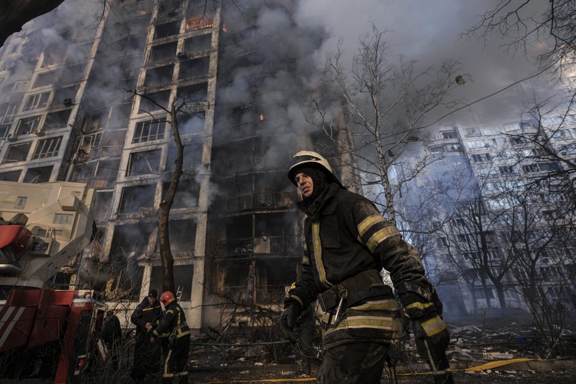A firefighter walks outside a destroyed apartment building after a bombing in a residential area in Kyiv, Ukraine, Tuesday, March 15, 2022. (AP Photo/Vadim Ghirda) A firefighter walks outside a destroyed apartment building after a bombing in a residential area in Kyiv, Ukraine, Tuesday, March 15, 2022. (AP Photo/Vadim Ghirda)