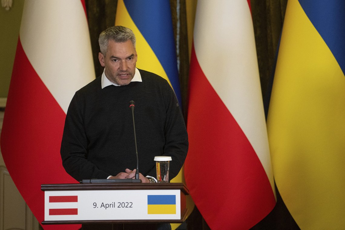 Austria's Chancellor Karl Nehammer talks during a news conference with Ukrainian President Volodymyr Zelenskyy in Kyiv, Ukraine, Saturday, April 9, 2022. Austria’s leader says he expects more European Union sanctions against Russia but is defending his country’s opposition so far to cutting off deliveries of Russian gas. Chancellor Karl Nehammer spoke Saturday after becoming the latest of several European leaders to meet Ukrainian President Volodymyr Zelenskyy in Kyiv. (AP Photo/Evgeniy Maloletka) Austria's Chancellor Karl Nehammer talks during a news conference with Ukrainian President Volodymyr Zelenskyy in Kyiv, Ukraine, Saturday, April 9, 2022. Austria’s leader says he expects more European Union sanctions against Russia but is defending his country’s opposition so far to cutting off deliveries of Russian gas. Chancellor Karl Nehammer spoke Saturday after becoming the latest of several European leaders to meet Ukrainian President Volodymyr Zelenskyy in Kyiv. (AP Photo/Evgeniy Maloletka)