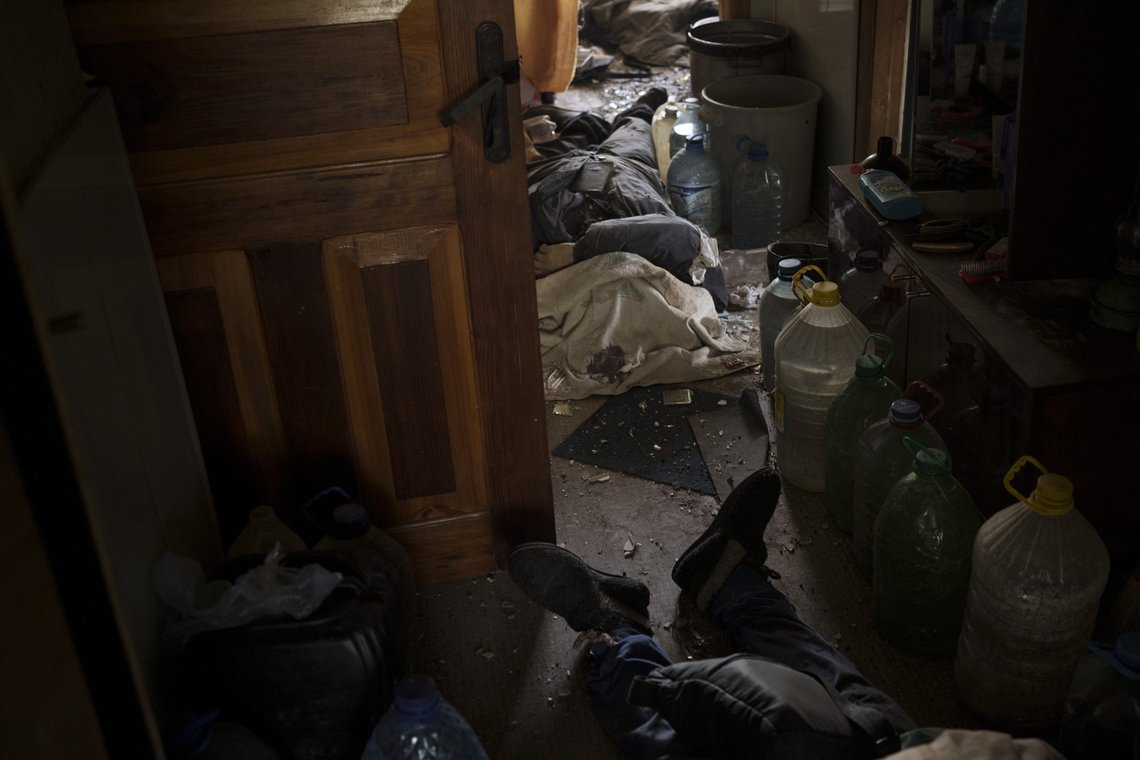 The bodies of three civilians lie in an apartment as Russian bombardments continue in a village recently retaken by Ukrainian forces near Kharkiv, Ukraine, Saturday, April 30, 2022. (AP Photo/Felipe Dana) The bodies of three civilians lie in an apartment as Russian bombardments continue in a village recently retaken by Ukrainian forces near Kharkiv, Ukraine, Saturday, April 30, 2022. (AP Photo/Felipe Dana)
