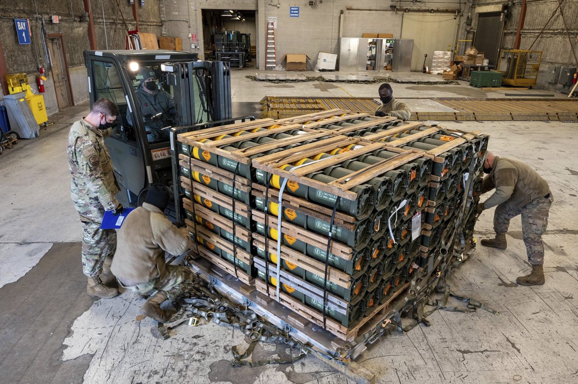FILE - In this image provided by the U.S. Air Force, Airmen and civilians from the 436th Aerial Port Squadron palletize ammunition, weapons and other equipment bound for Ukraine during a foreign military sales mission at Dover Air Force Base, Del., on Jan. 21, 2022. Western weaponry pouring into Ukraine helped blunt Russia's initial offensive and seems certain to play a central role in the approaching battle for Ukraine's contested Donbas region. Yet the Russian military is making little headway halting what has become a historic arms express. (Mauricio Campino/U.S. Air Force via AP) FILE - In this image provided by the U.S. Air Force, Airmen and civilians from the 436th Aerial Port Squadron palletize ammunition, weapons and other equipment bound for Ukraine during a foreign military sales mission at Dover Air Force Base, Del., on Jan. 21, 2022. Western weaponry pouring into Ukraine helped blunt Russia's initial offensive and seems certain to play a central role in the approaching battle for Ukraine's contested Donbas region. Yet the Russian military is making little headway halting what has become a historic arms express. (Mauricio Campino/U.S. Air Force via AP)