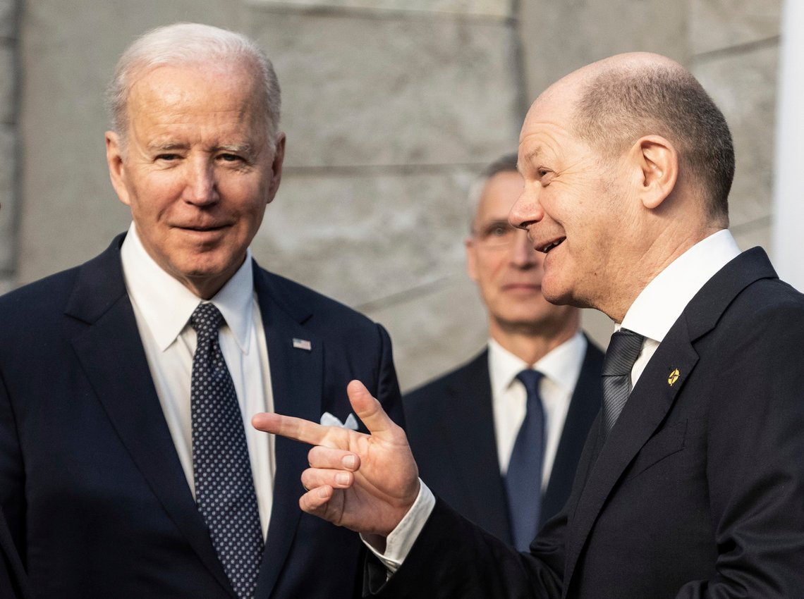 U.S. President Joe Biden, front left, and German Chancellor Olaf Scholz, front right, talk during an extraordinary NATO summit at NATO headquarters in Brussels, Belgium, Thursday, March 24, 2022. As the war in Ukraine grinds into a second month, President Joe Biden and Western allies are gathering to chart a path to ramp up pressure on Russian President Vladimir Putin while tending to the economic and security fallout that's spreading across Europe and the world. (Michael Kappeler/DPA via AP, Pool) U.S. President Joe Biden, front left, and German Chancellor Olaf Scholz, front right, talk during an extraordinary NATO summit at NATO headquarters in Brussels, Belgium, Thursday, March 24, 2022. As the war in Ukraine grinds into a second month, President Joe Biden and Western allies are gathering to chart a path to ramp up pressure on Russian President Vladimir Putin while tending to the economic and security fallout that's spreading across Europe and the world. (Michael Kappeler/DPA via AP, Pool)