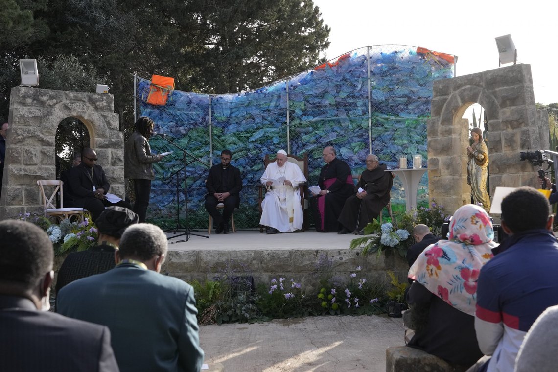 Pope Francis listens to Siriman Coulibaly, a migrant who has been living in Malta for four years, left, during a meeting at the 'John XXIII Peace Lab' center for migrants in Hal Far, Malta, Sunday, April 3, 2022. Pope Francis prayed for the world to show more kindness and compassion to refugees as he paid tribute Sunday in Malta to the shipwrecked St. Paul and meets with migrants who, like the apostle, arrived on the Mediterranean island and were welcomed. (AP Photo/Andrew Medichini) Pope Francis listens to Siriman Coulibaly, a migrant who has been living in Malta for four years, left, during a meeting at the 'John XXIII Peace Lab' center for migrants in Hal Far, Malta, Sunday, April 3, 2022. Pope Francis prayed for the world to show more kindness and compassion to refugees as he paid tribute Sunday in Malta to the shipwrecked St. Paul and meets with migrants who, like the apostle, arrived on the Mediterranean island and were welcomed. (AP Photo/Andrew Medichini)