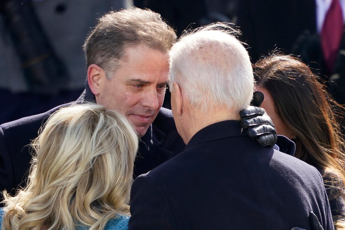 FILE - President Joe Biden hugs first lady Jill Biden, his son Hunter Biden and daughter Ashley Biden after being sworn-in during the 59th Presidential Inauguration at the U.S. Capitol in Washington, Jan. 20, 2021. A federal grand jury has heard testimony in recent months about Hunter Biden’s income and payments he received while serving on the board of an Ukraine energy company. That's according to two people familiar with the probe. (AP Photo/Carolyn Kaster, File) FILE - President Joe Biden hugs first lady Jill Biden, his son Hunter Biden and daughter Ashley Biden after being sworn-in during the 59th Presidential Inauguration at the U.S. Capitol in Washington, Jan. 20, 2021. A federal grand jury has heard testimony in recent months about Hunter Biden’s income and payments he received while serving on the board of an Ukraine energy company. That's according to two people familiar with the probe. (AP Photo/Carolyn Kaster, File)