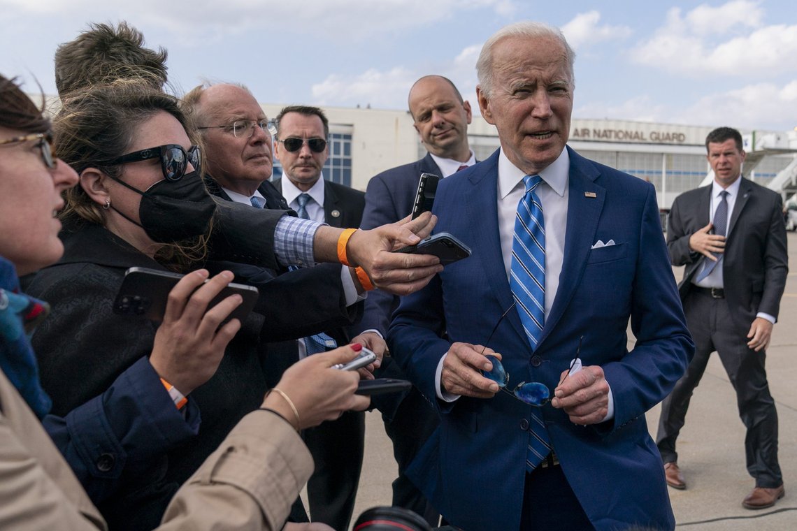 President Joe Biden speaks to the media before boarding Air Force One at Des Moines International Airport, in Des Moines Iowa, Tuesday, April 12, 2022, en route to Washington. Biden said that Russia's war in Ukraine amounted to a "genocide," accusing President Vladimir Putin of trying to "wipe out the idea of even being a Ukrainian." (AP Photo/Carolyn Kaster) President Joe Biden speaks to the media before boarding Air Force One at Des Moines International Airport, in Des Moines Iowa, Tuesday, April 12, 2022, en route to Washington. Biden said that Russia's war in Ukraine amounted to a "genocide," accusing President Vladimir Putin of trying to "wipe out the idea of even being a Ukrainian." (AP Photo/Carolyn Kaster)