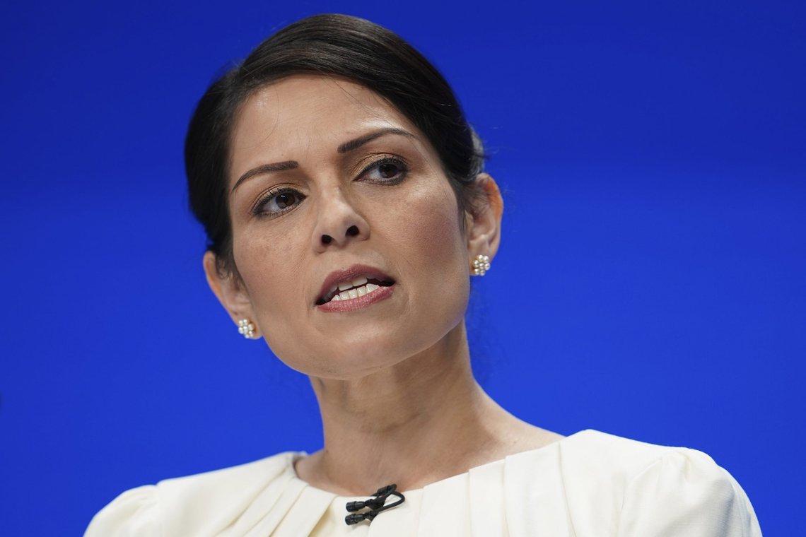 FILE - Britain's Home Secretary Priti Patel speaks at the Conservative Party Conference in Manchester, England, Tuesday, Oct. 5, 2021. The British government said Friday, Nov. 19, 2021, that it plans to ban the Palestinian militant group Hamas as a terrorist organization. The military wing of Hamas has been outlawed in the U.K. since 2001 but the organization as a whole is not proscribed. Home Secretary Priti Patel, who is in charge of law and order issues, said on Twitter that she had “acted to proscribe Hamas in its entirety.” (AP Photo/Jon Super, File) FILE - Britain's Home Secretary Priti Patel speaks at the Conservative Party Conference in Manchester, England, Tuesday, Oct. 5, 2021. The British government said Friday, Nov. 19, 2021, that it plans to ban the Palestinian militant group Hamas as a terrorist organization. The military wing of Hamas has been outlawed in the U.K. since 2001 but the organization as a whole is not proscribed. Home Secretary Priti Patel, who is in charge of law and order issues, said on Twitter that she had “acted to proscribe Hamas in its entirety.” (AP Photo/Jon Super, File)