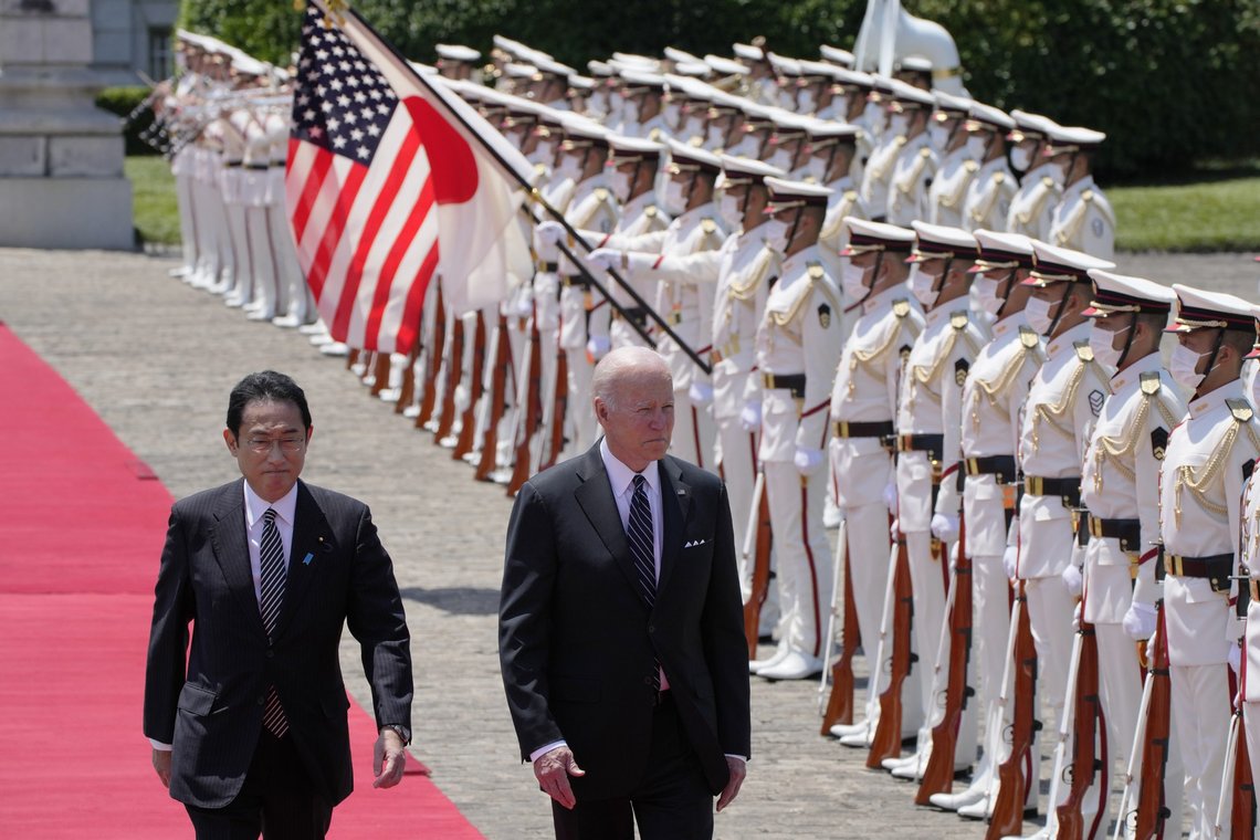 U.S. President Joe Biden, right, and Japan's Prime Minister Fumio Kishida, left, review an honor guard during a welcome ceremony for President Biden, at the Akasaka Palace state guest house in Tokyo, Japan, Monday, May 23, 2022. (AP Photo/Eugene Hoshiko, Pool) U.S. President Joe Biden, right, and Japan's Prime Minister Fumio Kishida, left, review an honor guard during a welcome ceremony for President Biden, at the Akasaka Palace state guest house in Tokyo, Japan, Monday, May 23, 2022. (AP Photo/Eugene Hoshiko, Pool)
