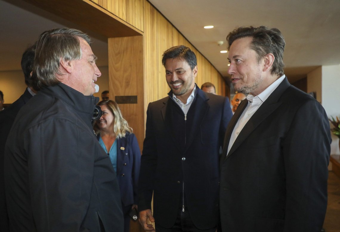 In this handout photo provided by the Ministry of Communication, Brazil's President Jair Bolsonaro, left, and Tesla and SpaceX chief executive officer Elon Musk meet in Porto Feliz, Brazil, Friday, May 20, 2022. Musk met with Bolsonaro on Friday to discuss connectivity and other projects in the Amazon rainforest. (Cleverson Oliveira/Ministry of Communication via AP) In this handout photo provided by the Ministry of Communication, Brazil's President Jair Bolsonaro, left, and Tesla and SpaceX chief executive officer Elon Musk meet in Porto Feliz, Brazil, Friday, May 20, 2022. Musk met with Bolsonaro on Friday to discuss connectivity and other projects in the Amazon rainforest. (Cleverson Oliveira/Ministry of Communication via AP)