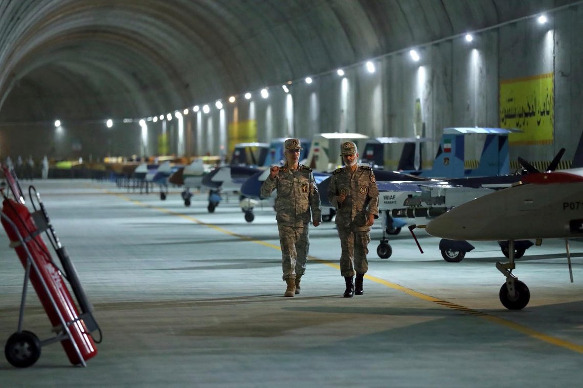 In this photo released on Saturday, May 28, 2022 by website of the Iranian Army, Chief of the General Staff of the Armed Forces Gen. Mohammad Hossein Bagheri, left, and Commander of the Army Gen. Abdolrahim Mousavi visit an underground drone base tunnel of the Army in the heart of the country's western Zagros Mountains. Iranian state television's report said Saturday, May 29 the tunnel was some 100 meters (330 feet) underground and was home to the Kaman-22 and Fotros drones, both capable of carrying cruise missiles. (Iranian Army via AP) In this photo released on Saturday, May 28, 2022 by website of the Iranian Army, Chief of the General Staff of the Armed Forces Gen. Mohammad Hossein Bagheri, left, and Commander of the Army Gen. Abdolrahim Mousavi visit an underground drone base tunnel of the Army in the heart of the country's western Zagros Mountains. Iranian state television's report said Saturday, May 29 the tunnel was some 100 meters (330 feet) underground and was home to the Kaman-22 and Fotros drones, both capable of carrying cruise missiles. (Iranian Army via AP)