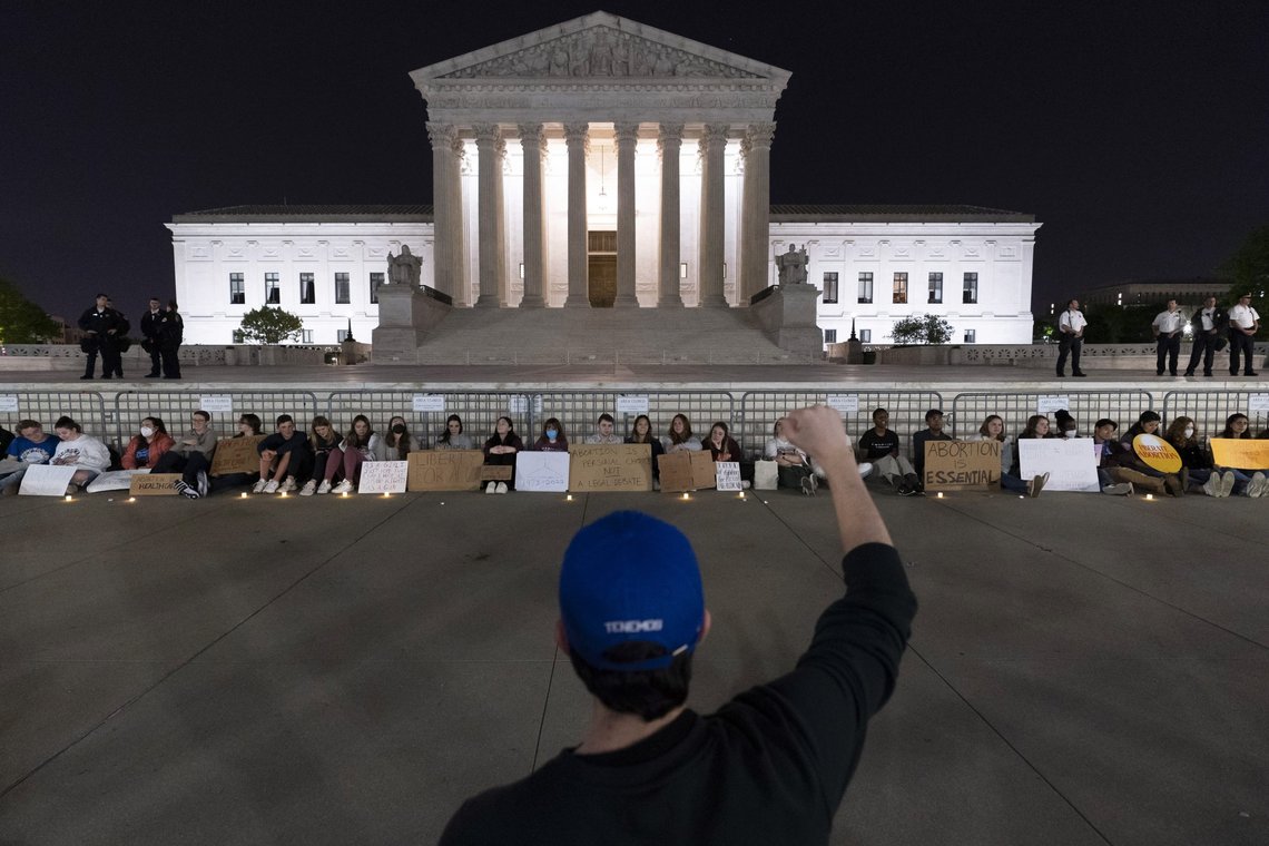 A crowd of people gather outside the Supreme Court early Tuesday, May 3, 2022, in Washington. A draft opinion suggests the U.S. Supreme Court could be poised to overturn the landmark 1973 Roe v. Wade case that legalized abortion nationwide, according to a Politico report released Monday. Whatever the outcome, the Politico report represents an extremely rare breach of the court's secretive deliberation process, and on a case of surpassing importance. (AP Photo/Alex Brandon) A crowd of people gather outside the Supreme Court early Tuesday, May 3, 2022, in Washington. A draft opinion suggests the U.S. Supreme Court could be poised to overturn the landmark 1973 Roe v. Wade case that legalized abortion nationwide, according to a Politico report released Monday. Whatever the outcome, the Politico report represents an extremely rare breach of the court's secretive deliberation process, and on a case of surpassing importance. (AP Photo/Alex Brandon)