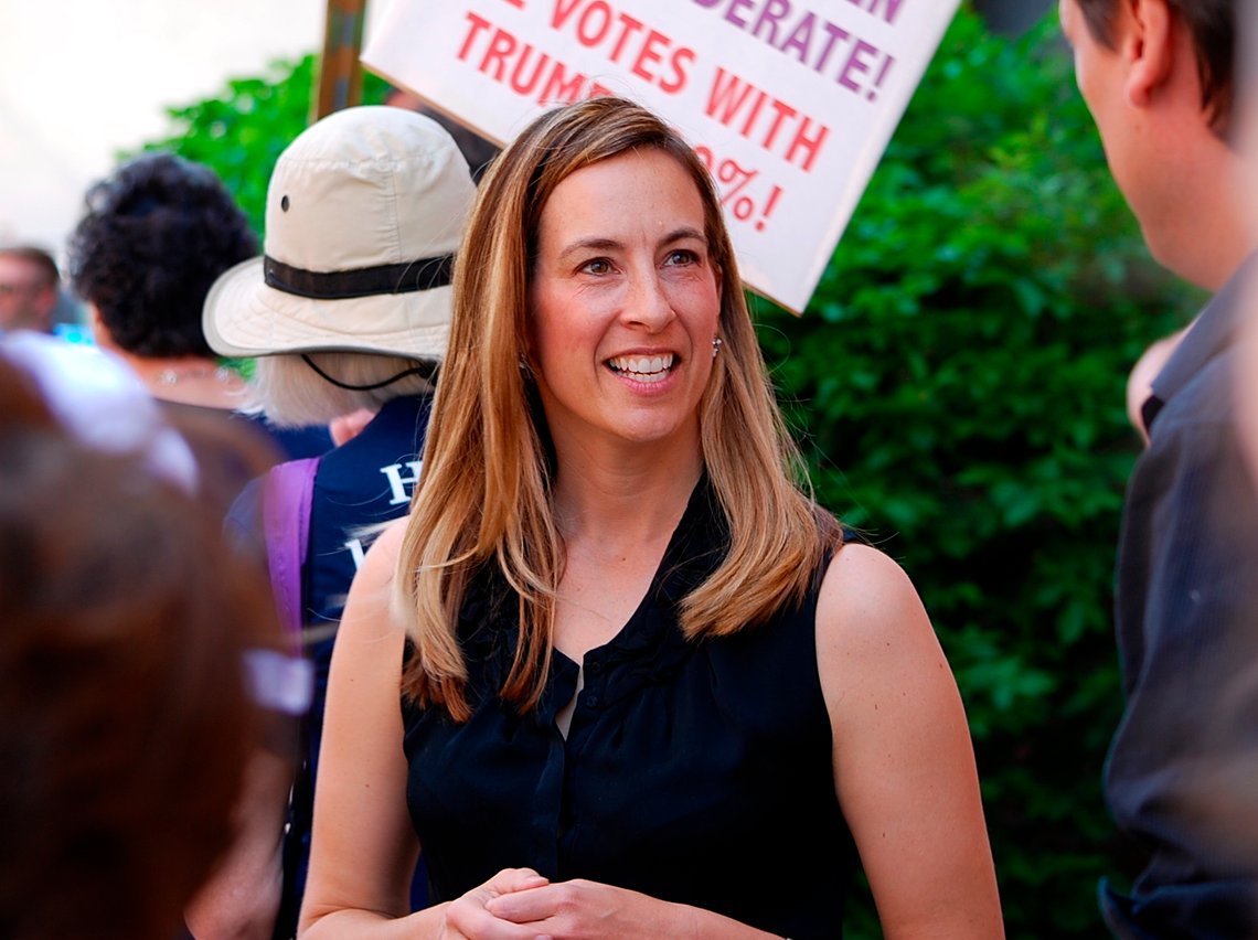 FILE- In this May 19, 2017, file photo, Mikie Sherrill joins protesters with NJ 11th for Change outside of U.S. Rep. Rodney Frelinghuysen's Morristown office. Sherrill, a former Navy helicopter pilot and federal prosecutor, is looking to capture a GOP congressional seat in New Jersey. Sherrill is one of some 200 women who have won their primaries for U.S. House, with 94 of these candidates surviving crowded fields with three or more candidates, according to an analysis of election results. (Justin Zaremba/NJ Advance Media via AP, File) FILE- In this May 19, 2017, file photo, Mikie Sherrill joins protesters with NJ 11th for Change outside of U.S. Rep. Rodney Frelinghuysen's Morristown office. Sherrill, a former Navy helicopter pilot and federal prosecutor, is looking to capture a GOP congressional seat in New Jersey. Sherrill is one of some 200 women who have won their primaries for U.S. House, with 94 of these candidates surviving crowded fields with three or more candidates, according to an analysis of election results. (Justin Zaremba/NJ Advance Media via AP, File)