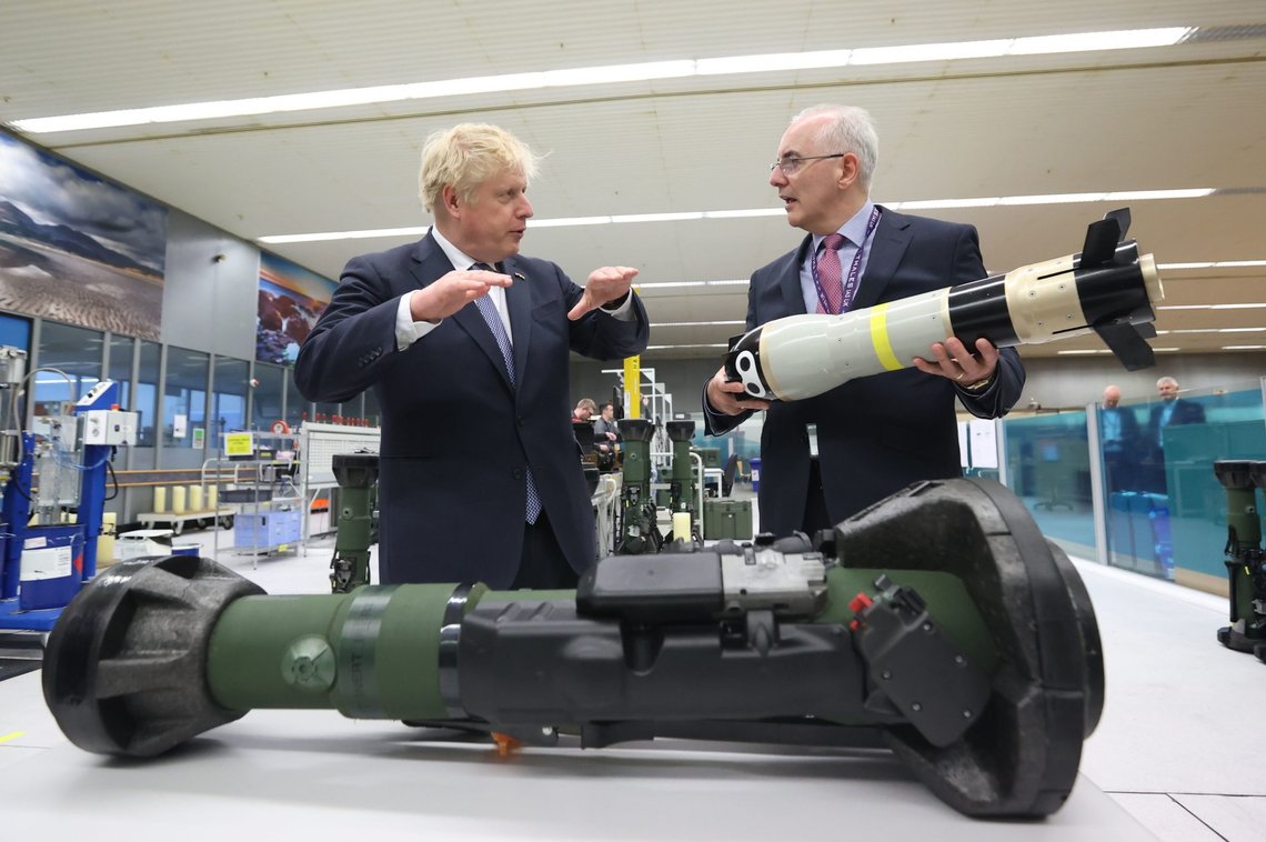 Britain's Prime Minister Boris Johnson is shown the missile from the inside of an NLAW (Next Generation Light Anti-Tank Weapon) by the Managing Director of Thales Belfast, Philip McBride, at Thales weapons manufacturer in Belfast, Monday May 16, 2022, during a visit to Northern Ireland. Johnson said there would be “a necessity to act” if the EU doesn't agree to overhaul post-Brexit trade rules that he says are destabilizing Northern Ireland's delicate political balance. Johnson held private talks with the leaders of Northern Ireland's main political parties, urging them to get back to work. (Liam McBurney/Pool via AP) Britain's Prime Minister Boris Johnson is shown the missile from the inside of an NLAW (Next Generation Light Anti-Tank Weapon) by the Managing Director of Thales Belfast, Philip McBride, at Thales weapons manufacturer in Belfast, Monday May 16, 2022, during a visit to Northern Ireland. Johnson said there would be “a necessity to act” if the EU doesn't agree to overhaul post-Brexit trade rules that he says are destabilizing Northern Ireland's delicate political balance. Johnson held private talks with the leaders of Northern Ireland's main political parties, urging them to get back to work. (Liam McBurney/Pool via AP)
