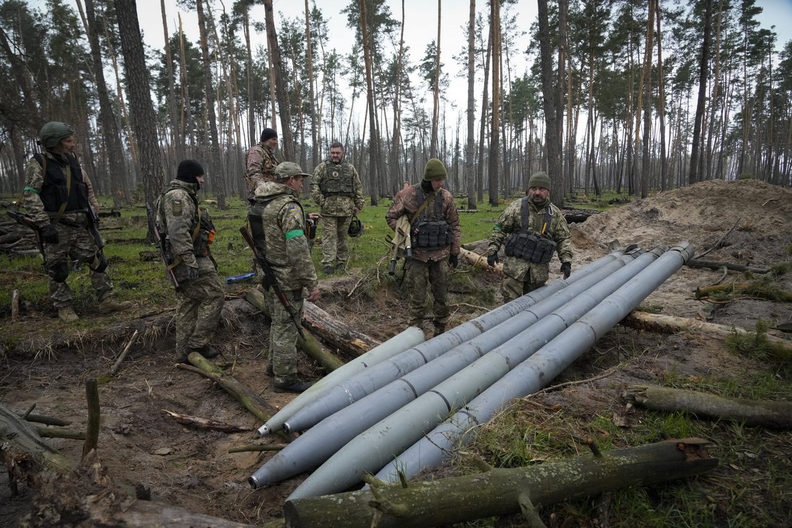 FILE - Ukrainian soldiers examine Russian multiple missiles abandoned by Russian troops, in the village of Berezivka, Ukraine, April 21, 2022. An interminable and unwinnable war in Europe? That's what NATO leaders fear and are bracing for as Russia's war in Ukraine grinds into its third month with little sign of a decisive military victory for either side, and no resolution in sight. (AP Photo/Efrem Lukatsky, File) FILE - Ukrainian soldiers examine Russian multiple missiles abandoned by Russian troops, in the village of Berezivka, Ukraine, April 21, 2022. An interminable and unwinnable war in Europe? That's what NATO leaders fear and are bracing for as Russia's war in Ukraine grinds into its third month with little sign of a decisive military victory for either side, and no resolution in sight. (AP Photo/Efrem Lukatsky, File)