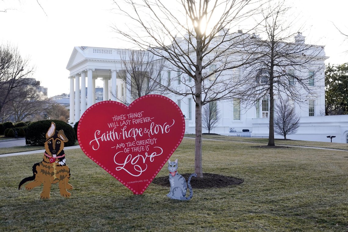 A Valentine's heart and depictions of President Joe Biden and first lady Jill Biden's pet dog Commander, left, and cat Willow, stand on the North Lawn of the White House in celebration of Valentine's Day, Monday, Feb. 14, 2022, in Washington. (AP Photo/Patrick Semansky) A Valentine's heart and depictions of President Joe Biden and first lady Jill Biden's pet dog Commander, left, and cat Willow, stand on the North Lawn of the White House in celebration of Valentine's Day, Monday, Feb. 14, 2022, in Washington. (AP Photo/Patrick Semansky)