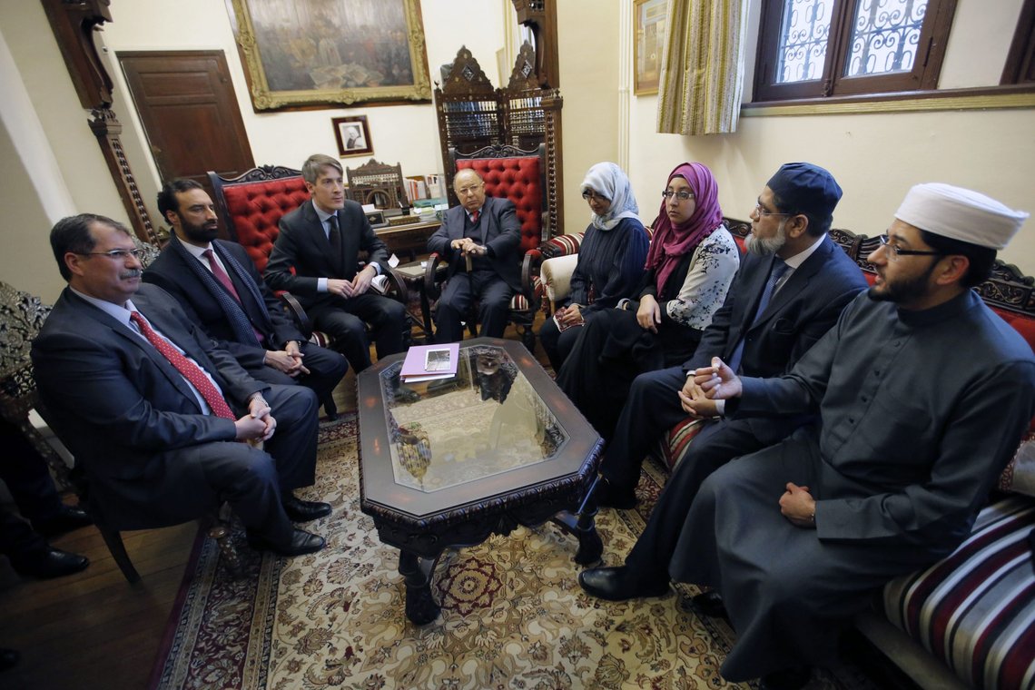 From left, Anouar Kbibech, president of Rassemblement of Muslims of France, (RMF), Sahukat Warraich, British Chief Editor at Imams Online and CEO at Faith Associates, Thomas Andrieu, a top aide to the French Interior Minister, Great Mosque of Paris rector Dalil Boubakeur, Khola Hasan, speaker and author from London, Naima Ali Khan, teacher at Birmingham's Quran Academy, Zaheer Shabir, Imam at Bristol Council of Mosques, listen to Qari Mohammed Asim MBE, Senior Imam At Leeds' Makkah Masjid during a meeting at the Grand Central Mosque in Paris, France, Monday, Feb. 2, 2015. British Imams travel to Paris to meet with Muslim and Jewish leaders to stand together in solidarity against extremism. (AP Photo/Francois Mori) From left, Anouar Kbibech, president of Rassemblement of Muslims of France, (RMF), Sahukat Warraich, British Chief Editor at Imams Online and CEO at Faith Associates, Thomas Andrieu, a top aide to the French Interior Minister, Great Mosque of Paris rector Dalil Boubakeur, Khola Hasan, speaker and author from London, Naima Ali Khan, teacher at Birmingham's Quran Academy, Zaheer Shabir, Imam at Bristol Council of Mosques, listen to Qari Mohammed Asim MBE, Senior Imam At Leeds' Makkah Masjid during a meeting at the Grand Central Mosque in Paris, France, Monday, Feb. 2, 2015. British Imams travel to Paris to meet with Muslim and Jewish leaders to stand together in solidarity against extremism. (AP Photo/Francois Mori)