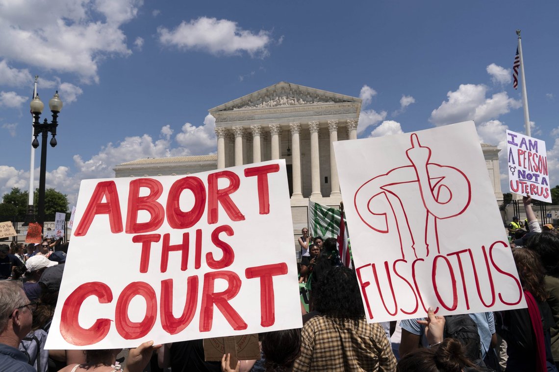 EDS NOTE: OBSCENITY - Abortion right activists protest outside the Supreme Court in Washington, Saturday, June 25, 2022. The Supreme Court has ended constitutional protections for abortion that had been in place nearly 50 years, a decision by its conservative majority to overturn the court's landmark abortion cases. (AP Photo/Jose Luis Magana) EDS NOTE: OBSCENITY - Abortion right activists protest outside the Supreme Court in Washington, Saturday, June 25, 2022. The Supreme Court has ended constitutional protections for abortion that had been in place nearly 50 years, a decision by its conservative majority to overturn the court's landmark abortion cases. (AP Photo/Jose Luis Magana)
