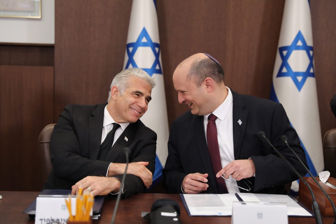 Israeli Prime Minister Naftali Bennett, right, and Foreign Minister Yair Lapid attend a cabinet meeting at the Prime Minister's office in Jerusalem, Sunday, June 19, 2022. (Abir Sultan/Pool Photo via AP) Israeli Prime Minister Naftali Bennett, right, and Foreign Minister Yair Lapid attend a cabinet meeting at the Prime Minister's office in Jerusalem, Sunday, June 19, 2022. (Abir Sultan/Pool Photo via AP)