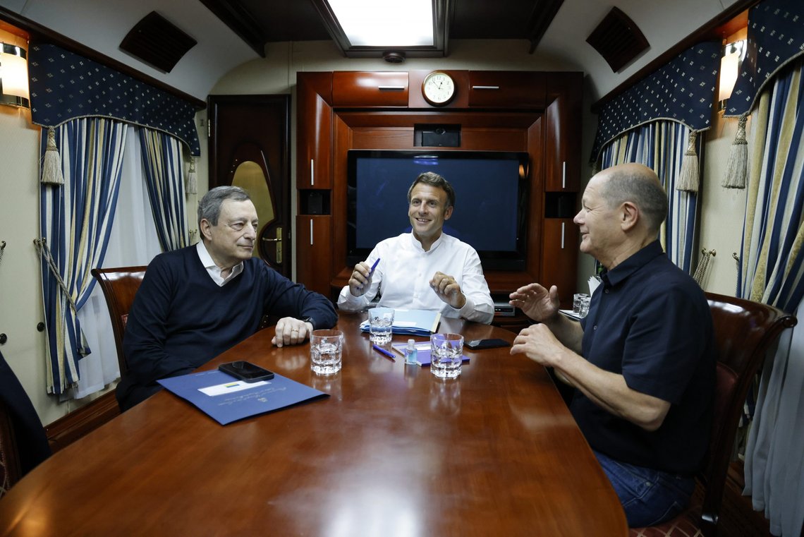 French President Emmanuel Macron, center, German Chancellor Olaf Scholz, right, and Italian Prime Minister Mario Draghi travel on board a train bound to Kyiv after departing from Poland Thursday, June 16, 2022. The Europeans leaders are expected to meet with Ukraine's President Volodymyr Zelenskyy as they prepare for a key European Union leaders' summit in Brussels next week and a June 29-30 NATO summit in Madrid.(Ludovic Marin, Pool via AP) French President Emmanuel Macron, center, German Chancellor Olaf Scholz, right, and Italian Prime Minister Mario Draghi travel on board a train bound to Kyiv after departing from Poland Thursday, June 16, 2022. The Europeans leaders are expected to meet with Ukraine's President Volodymyr Zelenskyy as they prepare for a key European Union leaders' summit in Brussels next week and a June 29-30 NATO summit in Madrid.(Ludovic Marin, Pool via AP)