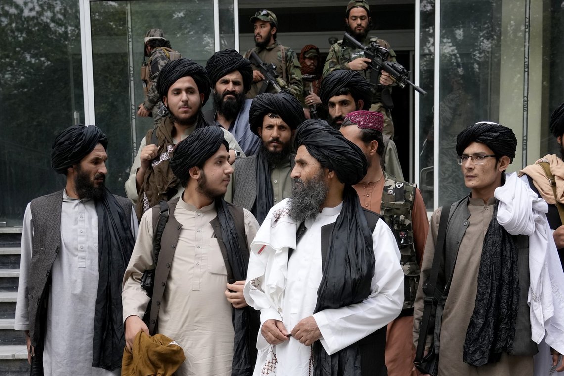 FILE - Mullah Abdul Ghani Baradar, acting deputy prime minister of the Afghan Taliban's caretaker government, center, and other Taliban officials attend a ceremony marking the 9th anniversary of the death of Mullah Mohammad Omar, the late leader and founder of the Taliban, in Kabul, Afghanistan, April 24, 2022. The Pakistani Taliban said Wednesday May 18, 2022, that they are extending a cease-fire with the government in Islamabad until May 30, after the two sides held an initial round of talks in neighboring Afghanistan. The militant group, known as Tehrik-e-Taliban Pakistan or TTP, said in a statement on Wednesday that the talks were facilitated by Afghanistan’s new Taliban rulers. (AP Photo/Ebrahim Noroozi, File) FILE - Mullah Abdul Ghani Baradar, acting deputy prime minister of the Afghan Taliban's caretaker government, center, and other Taliban officials attend a ceremony marking the 9th anniversary of the death of Mullah Mohammad Omar, the late leader and founder of the Taliban, in Kabul, Afghanistan, April 24, 2022. The Pakistani Taliban said Wednesday May 18, 2022, that they are extending a cease-fire with the government in Islamabad until May 30, after the two sides held an initial round of talks in neighboring Afghanistan. The militant group, known as Tehrik-e-Taliban Pakistan or TTP, said in a statement on Wednesday that the talks were facilitated by Afghanistan’s new Taliban rulers. (AP Photo/Ebrahim Noroozi, File)