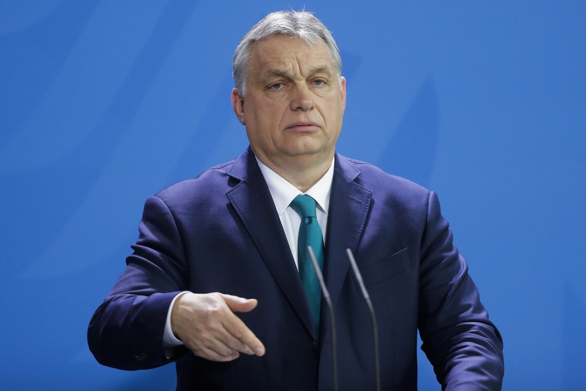 Hungary's Prime Minister Victor Orban briefs the media during a joint statement with German Chancellor Angela Merkel prior to a meeting at the chancellery in Berlin, Germany, Monday, Feb. 10, 2020. (AP Photo/Markus Schreiber) Hungary's Prime Minister Victor Orban briefs the media during a joint statement with German Chancellor Angela Merkel prior to a meeting at the chancellery in Berlin, Germany, Monday, Feb. 10, 2020. (AP Photo/Markus Schreiber)