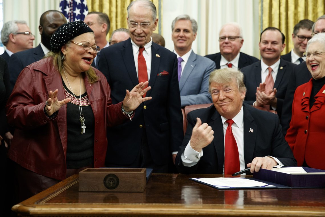 President Donald Trump reacts as Alveda King, niece of Rev. Martin Luther King Jr., speaks during a signing ceremony for criminal justice reform in the Oval Office of the White House, Friday, Dec. 21, 2018, in Washington. (AP Photo/Evan Vucci) President Donald Trump reacts as Alveda King, niece of Rev. Martin Luther King Jr., speaks during a signing ceremony for criminal justice reform in the Oval Office of the White House, Friday, Dec. 21, 2018, in Washington. (AP Photo/Evan Vucci)