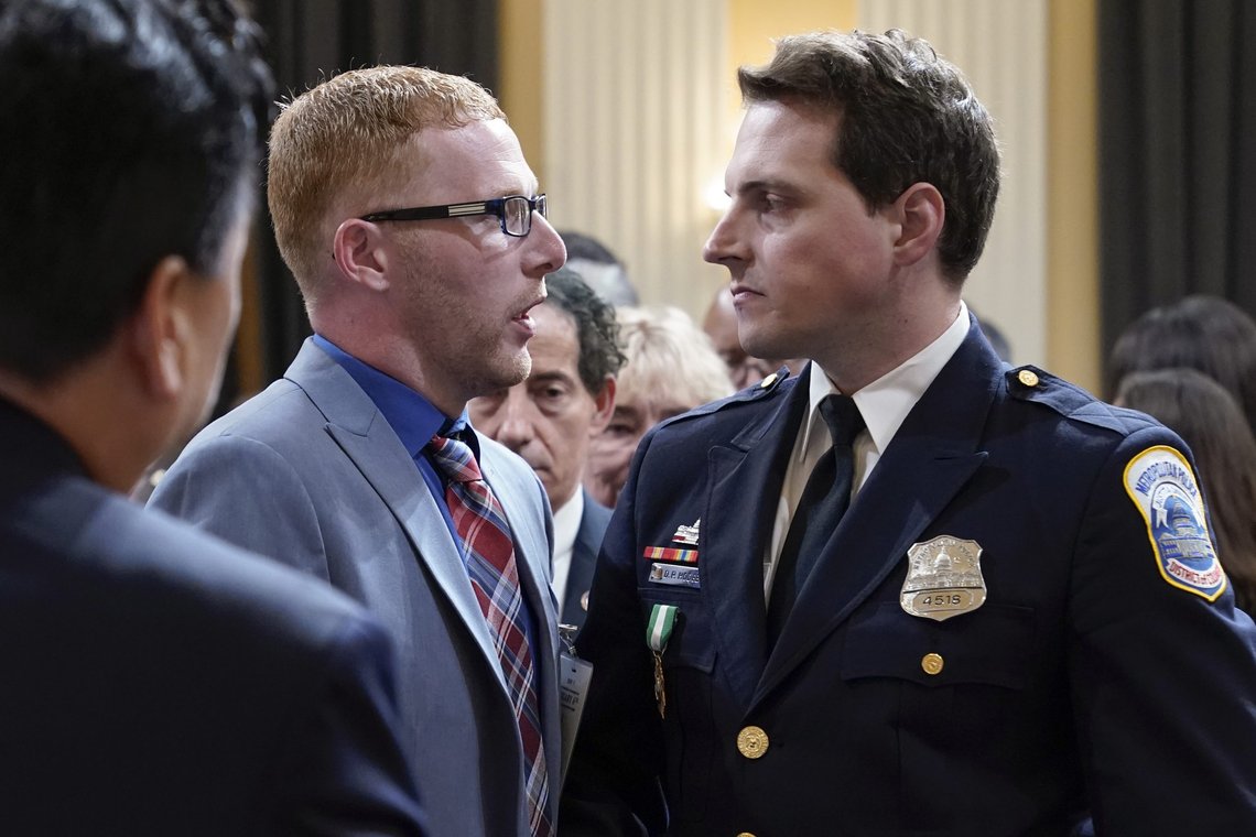 Stephen Ayres, who pleaded guilty last in June 2022 to disorderly and disruptive conduct in a restricted building, shakes hands with Washington Metropolitan Police Department officer Daniel Hodges as the hearing with the House select committee investigating the Jan. 6 attack on the U.S. Capitol, concludes at the Capitol in Washington, Tuesday, July 12, 2022. (AP Photo/Jacquelyn Martin) Stephen Ayres, who pleaded guilty last in June 2022 to disorderly and disruptive conduct in a restricted building, shakes hands with Washington Metropolitan Police Department officer Daniel Hodges as the hearing with the House select committee investigating the Jan. 6 attack on the U.S. Capitol, concludes at the Capitol in Washington, Tuesday, July 12, 2022. (AP Photo/Jacquelyn Martin)