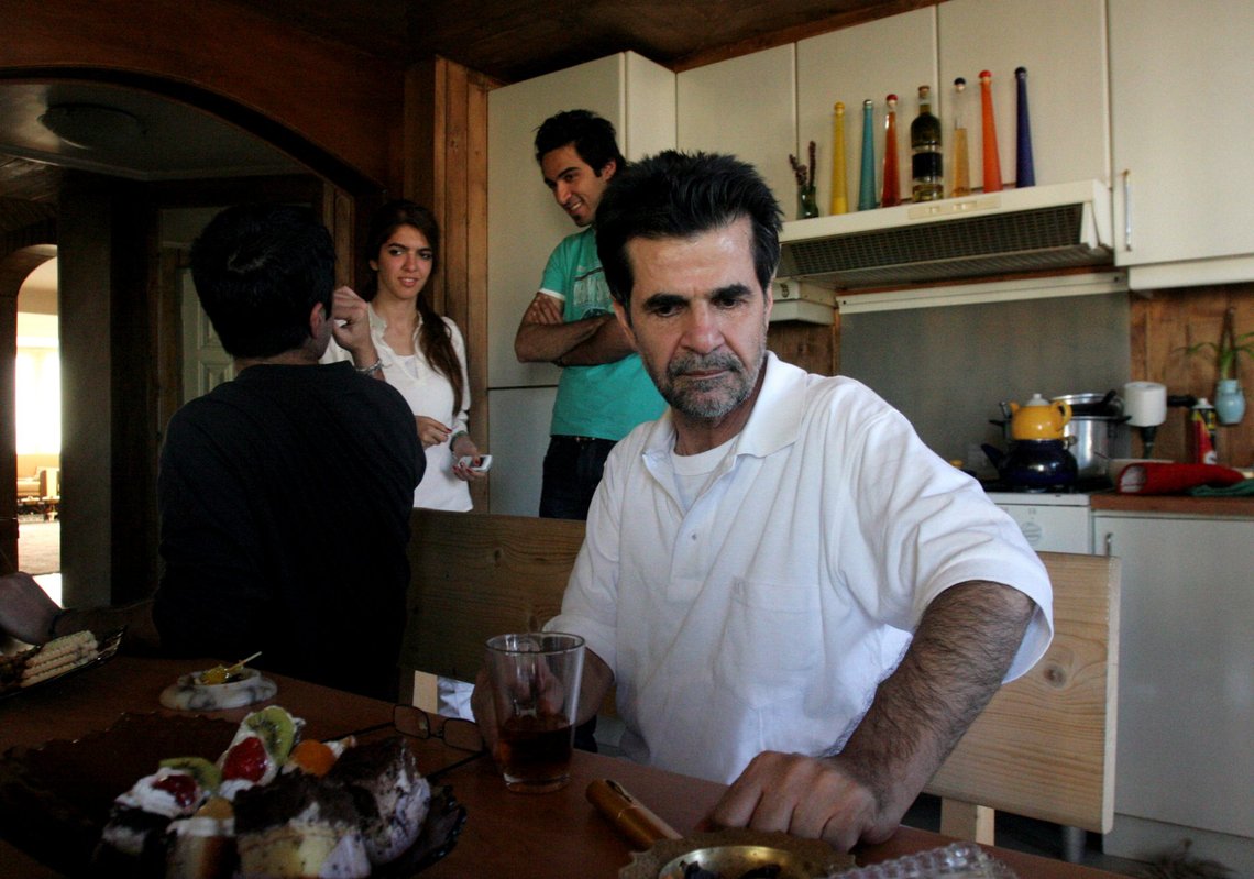 FILE - In this May 25, 2010 fil ephoto, Iranian filmmaker Jafar Panahi is shown at his home after he was freed from jail on bail after more than two months in custody, in Tehran, Iran. Hollywood organizations and entertainment unions are uniting in support of filmmakers jailed in Iran. Earlier this week, an Iranian actress was sentenced to one year in prison and 90 lashes for her role in a film that is critical of the Iranian government. (AP Photo, file) FILE - In this May 25, 2010 fil ephoto, Iranian filmmaker Jafar Panahi is shown at his home after he was freed from jail on bail after more than two months in custody, in Tehran, Iran. Hollywood organizations and entertainment unions are uniting in support of filmmakers jailed in Iran. Earlier this week, an Iranian actress was sentenced to one year in prison and 90 lashes for her role in a film that is critical of the Iranian government. (AP Photo, file)
