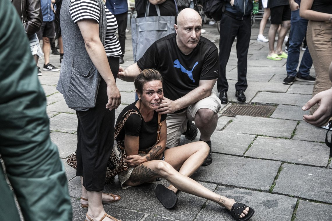 People help a woman in front of the Fields shopping center in Copenhagen, Denmark, Sunday, July 3, 2022. A gunman opened fire inside the busy shopping mall in the Danish capital Sunday, killing a few people and critically wounding a few others, police said. (Olafur Steinar Rye Gestsson/Ritzau Scanpix via AP) People help a woman in front of the Fields shopping center in Copenhagen, Denmark, Sunday, July 3, 2022. A gunman opened fire inside the busy shopping mall in the Danish capital Sunday, killing a few people and critically wounding a few others, police said. (Olafur Steinar Rye Gestsson/Ritzau Scanpix via AP)