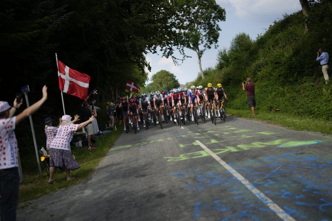 The pack rides during the third stage of the Tour de France cycling race over 182 kilometers (113 miles) with start in Vejle and finish in Sonderborg, Denmark, Sunday, July 3, 2022. (AP Photo/Thibault Camus) The pack rides during the third stage of the Tour de France cycling race over 182 kilometers (113 miles) with start in Vejle and finish in Sonderborg, Denmark, Sunday, July 3, 2022. (AP Photo/Thibault Camus)