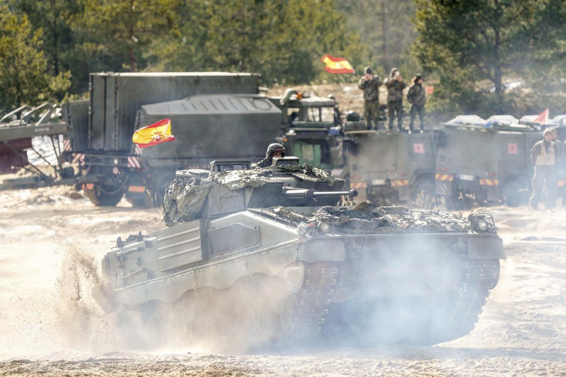 A Spanish armored vehicle drives during the NATO military exercises Crystal arrow 2022 at the Adazi military range, Latvia, Friday, March 11, 2022. About 2,800 soldiers from Albania, Canada, Czech Republic, Italy, Iceland, Montenegro, Poland, Slovakia, Slovenia, Spain, Latvia and the United States attend the training for interoperability during tactical military operations, including the demonstration of winter capability. (Martins Zilgalvis/F64 via AP) A Spanish armored vehicle drives during the NATO military exercises Crystal arrow 2022 at the Adazi military range, Latvia, Friday, March 11, 2022. About 2,800 soldiers from Albania, Canada, Czech Republic, Italy, Iceland, Montenegro, Poland, Slovakia, Slovenia, Spain, Latvia and the United States attend the training for interoperability during tactical military operations, including the demonstration of winter capability. (Martins Zilgalvis/F64 via AP)