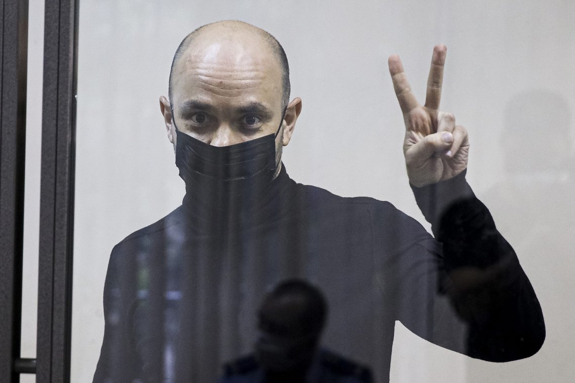 FILE - Andrei Pivovarov, head of the Open Russia movement, gestures during a court session in Krasnodar, Russia, Wednesday, June 2, 2021. Andrei Pivovarov, former head of the Open Russia group, was sentenced to four years in prison for "directing an undesirable organization," a criminal offense under a 2015 law. He has maintained his innocence and has insisted that the charges against him were brought because of his plans to run for parliament in September 2021. (AP Photo, File) FILE - Andrei Pivovarov, head of the Open Russia movement, gestures during a court session in Krasnodar, Russia, Wednesday, June 2, 2021. Andrei Pivovarov, former head of the Open Russia group, was sentenced to four years in prison for "directing an undesirable organization," a criminal offense under a 2015 law. He has maintained his innocence and has insisted that the charges against him were brought because of his plans to run for parliament in September 2021. (AP Photo, File)