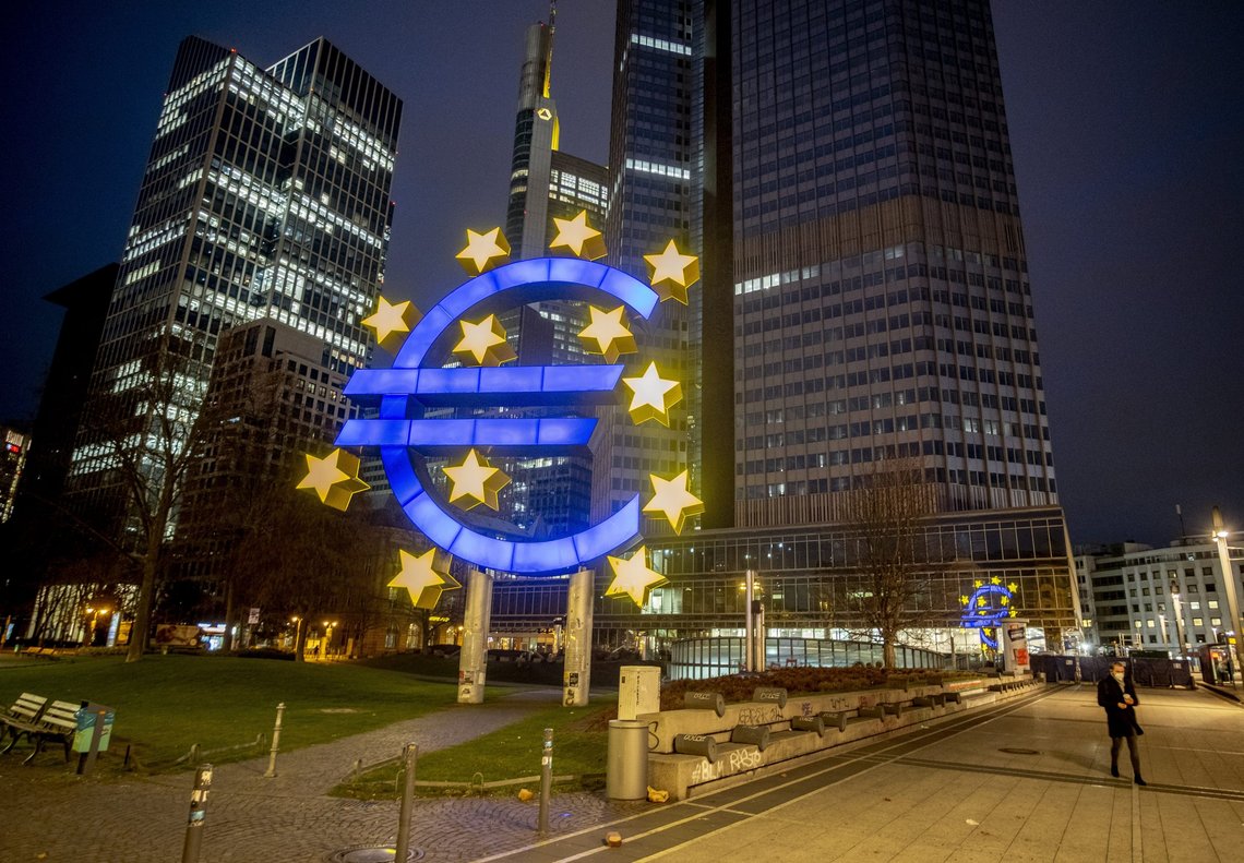 FILE - A man walks past the Euro sculpture in Frankfurt, Germany, March 11, 2021. The European Central Bank is behind the U.S. Federal Reserve and other central banks around the world in combating surging inflation. It’s looking to catch up as it raises interest rates for the first time in 11 years Thursday July 21, 2022, but it also faces a more serious threat of recession than other places amid an energy crisis provoked by Russia’s war in Ukraine. (AP Photo/Michael Probst, File) FILE - A man walks past the Euro sculpture in Frankfurt, Germany, March 11, 2021. The European Central Bank is behind the U.S. Federal Reserve and other central banks around the world in combating surging inflation. It’s looking to catch up as it raises interest rates for the first time in 11 years Thursday July 21, 2022, but it also faces a more serious threat of recession than other places amid an energy crisis provoked by Russia’s war in Ukraine. (AP Photo/Michael Probst, File)