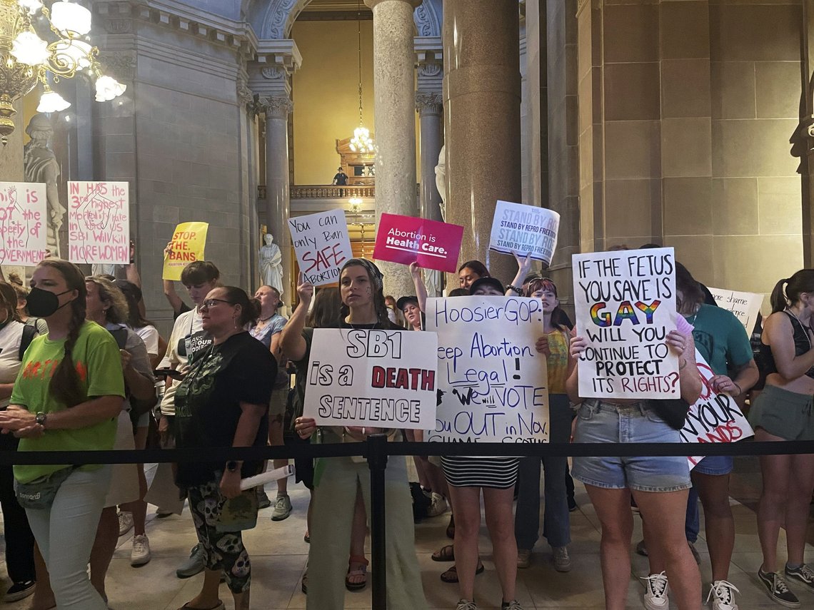 Abortion-rights protesters fill Indiana Statehouse corridors and cheer outside legislative chambers, Friday, Aug. 5, 2022, as lawmakers vote to concur on a near-total abortion ban, in Indianapolis. (AP Photo/Arleigh Rodgers) Abortion-rights protesters fill Indiana Statehouse corridors and cheer outside legislative chambers, Friday, Aug. 5, 2022, as lawmakers vote to concur on a near-total abortion ban, in Indianapolis. (AP Photo/Arleigh Rodgers)