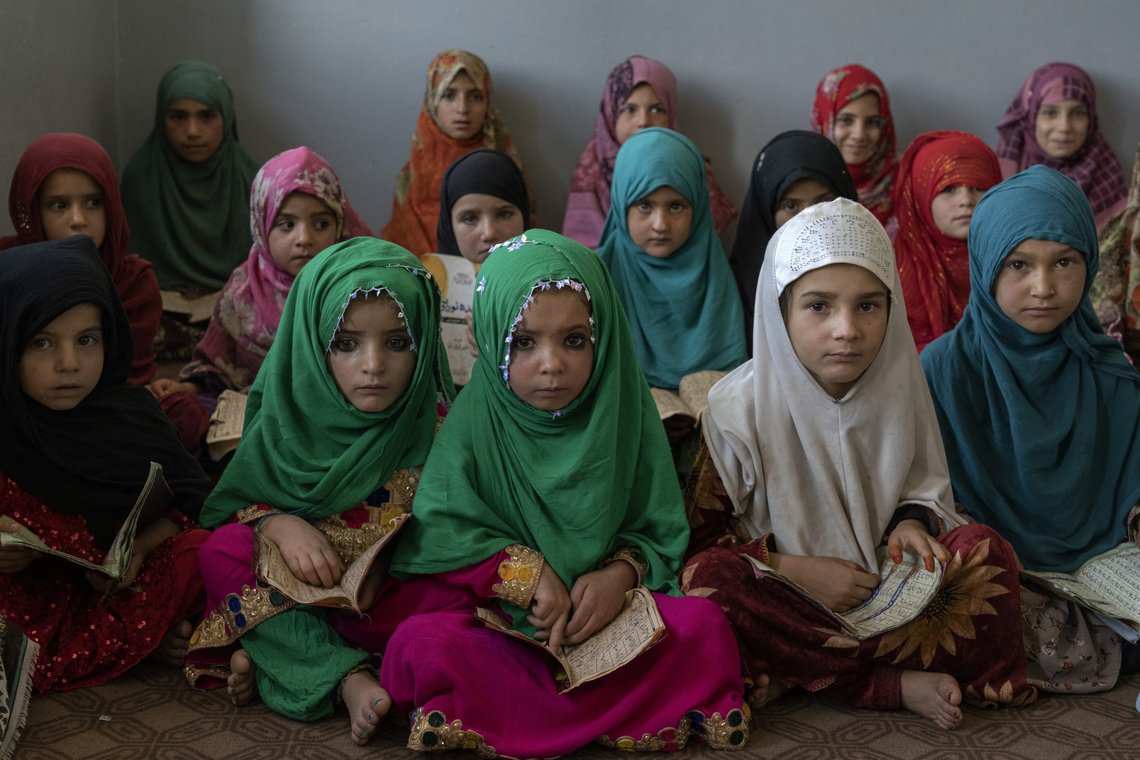 Afghan girls read the Quran in the Noor Mosque outside the city of Kabul, Afghanistan, Wednesday, Aug 3, 2022. Maulvi Bakhtullah, the head of the mosque, said that the number of girls who come to this mosque to learn Quran has multiplied after the closure of public schools. For most teenage girls in Afghanistan, it’s been a year since they set foot in a classroom. With no sign the ruling Taliban will allow them back to school, some girls and parents are trying to find ways to keep education from stalling for a generation of young women. (AP Photo/Ebrahim Noroozi) Afghan girls read the Quran in the Noor Mosque outside the city of Kabul, Afghanistan, Wednesday, Aug 3, 2022. Maulvi Bakhtullah, the head of the mosque, said that the number of girls who come to this mosque to learn Quran has multiplied after the closure of public schools. For most teenage girls in Afghanistan, it’s been a year since they set foot in a classroom. With no sign the ruling Taliban will allow them back to school, some girls and parents are trying to find ways to keep education from stalling for a generation of young women. (AP Photo/Ebrahim Noroozi)