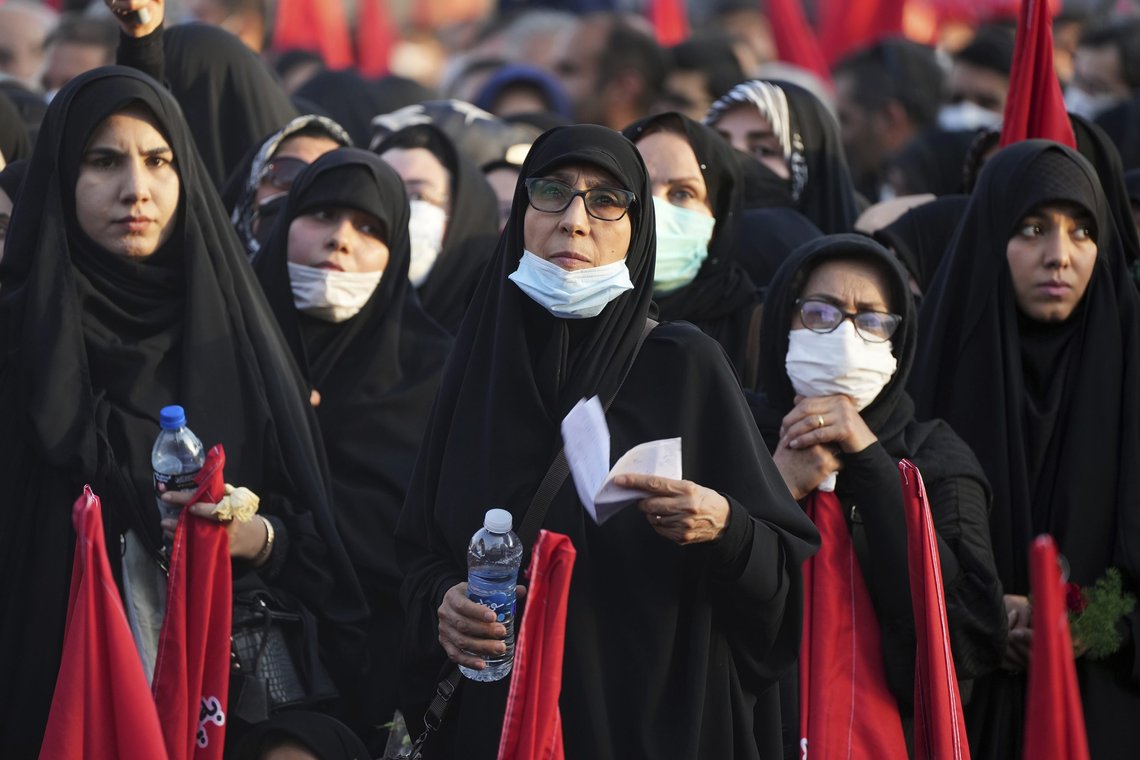 Mourners listen to speech of paramilitary Revolutionary Guard commander Gen. Hossein Salami during the funeral ceremony of five members of the Guard killed in Syria, whose remains were recently recovered, in Tehran, Iran, Thursday, Aug. 4, 2022. (AP Photo/Vahid Salemi) Mourners listen to speech of paramilitary Revolutionary Guard commander Gen. Hossein Salami during the funeral ceremony of five members of the Guard killed in Syria, whose remains were recently recovered, in Tehran, Iran, Thursday, Aug. 4, 2022. (AP Photo/Vahid Salemi)