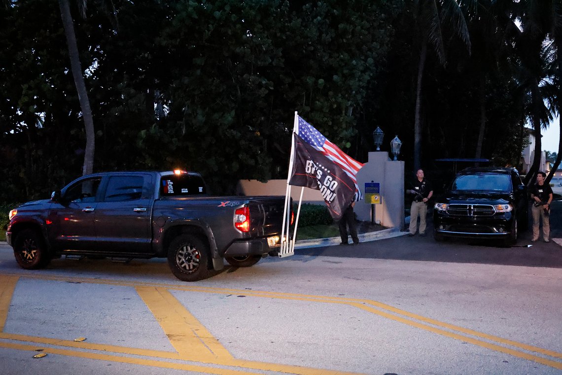 Supporters of former President Donald Trump drive past his Mar-a-Lago estate, Monday, Aug. 8, 2022, in Palm Beach, Fla. Trump said in a lengthy statement that the FBI was conducting a search of his Mar-a-Lago estate and asserted that agents had broken open a safe. (AP Photo/Terry Renna) Supporters of former President Donald Trump drive past his Mar-a-Lago estate, Monday, Aug. 8, 2022, in Palm Beach, Fla. Trump said in a lengthy statement that the FBI was conducting a search of his Mar-a-Lago estate and asserted that agents had broken open a safe. (AP Photo/Terry Renna)