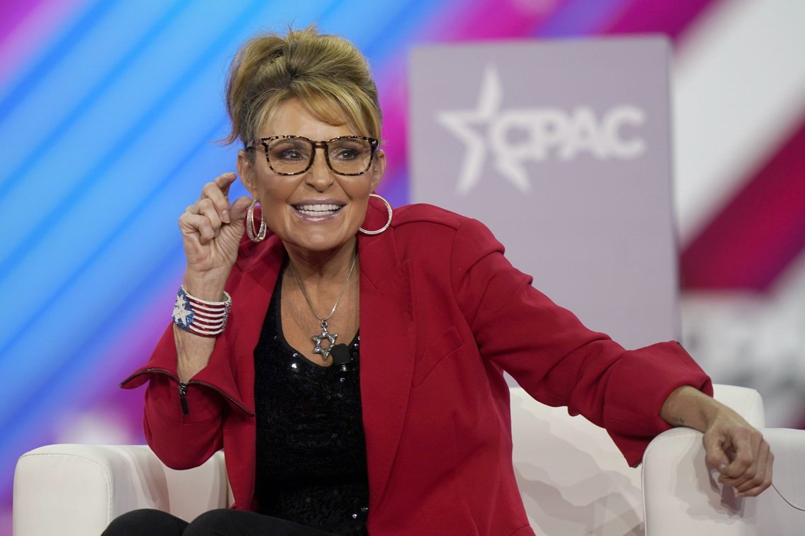 Former Alaska Gov. Sarah Palin makes a joke about the size of the state of Texas compared to Alaska during her appearance at the Conservative Political Action Conference (CPAC) in Dallas, Thursday, Aug. 4, 2022. (AP Photo/LM Otero) Former Alaska Gov. Sarah Palin makes a joke about the size of the state of Texas compared to Alaska during her appearance at the Conservative Political Action Conference (CPAC) in Dallas, Thursday, Aug. 4, 2022. (AP Photo/LM Otero)