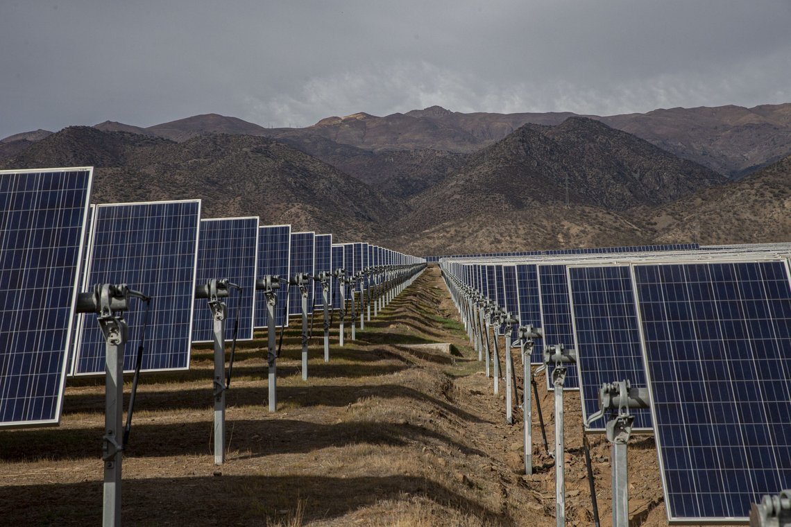 FILE - Solar panels stand in the Quilapilún solar energy plant, a joint venture by Chile and China, in Colina, Chile, Aug. 20, 2019. Chile has long held itself out as a global leader in the fight against climate change and now nearly 22% of Chile’s power is generated by solar and wind farms, putting it far ahead of both the global average, 10%. (AP Photo/Esteban Felix, File) FILE - Solar panels stand in the Quilapilún solar energy plant, a joint venture by Chile and China, in Colina, Chile, Aug. 20, 2019. Chile has long held itself out as a global leader in the fight against climate change and now nearly 22% of Chile’s power is generated by solar and wind farms, putting it far ahead of both the global average, 10%. (AP Photo/Esteban Felix, File)