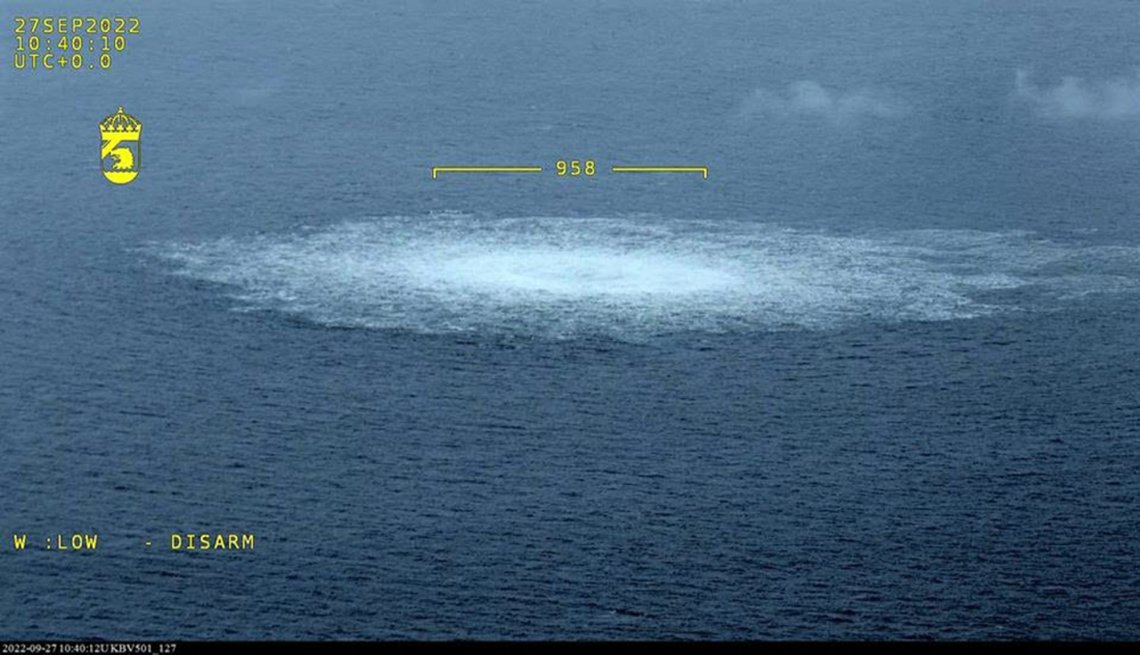 This handout photo released on September 27, 2022 and taken from an aircraft of the Swedish Coast Guard (Kustbevakningen) shows the release of gas emanating from a leak on a Nord Stream gas pipeline in the Swedish economic zone in the Baltic Sea, near the Danish island of Bornholm. - Three unexplained gas leaks, preceded by two explosions, occurred on the Baltic Sea's Nord Stream 1 and 2 pipelines on September 26, 2022. The Nord Stream 1 and 2 pipelines are strategic infrastructure linking Russia to Europe. While both were not in operation, they contained gas, which the leaks sent bubbling to the surface in Sweden and Denmark's economic zones. The pipelines have been at the centre of geopolitical tensions in recent months as Russia cut gas supplies to Europe in suspected retaliation against Western sanctions following its military intervention in Ukraine. It could take up to two weeks before the unexplained gas leaks can be inspected, the Danish defence minister said on September 28. (Photo by Handout / SWEDISH COAST GUARD / AFP) / RESTRICTED TO EDITORIAL USE - MANDATORY CREDIT "AFP PHOTO / SWEDISH COAST GUARD" - NO MARKETING - NO ADVERTISING CAMPAIGNS - DISTRIBUTED AS A SERVICE TO CLIENTS This handout photo released on September 27, 2022 and taken from an aircraft of the Swedish Coast Guard (Kustbevakningen) shows the release of gas emanating from a leak on a Nord Stream gas pipeline in the Swedish economic zone in the Baltic Sea, near the Danish island of Bornholm. - Three unexplained gas leaks, preceded by two explosions, occurred on the Baltic Sea's Nord Stream 1 and 2 pipelines on September 26, 2022. The Nord Stream 1 and 2 pipelines are strategic infrastructure linking Russia to Europe. While both were not in operation, they contained gas, which the leaks sent bubbling to the surface in Sweden and Denmark's economic zones. The pipelines have been at the centre of geopolitical tensions in recent months as Russia cut gas supplies to Europe in suspected retaliation against Western sanctions following its military intervention in Ukraine. It could take up to two weeks before the unexplained gas leaks can be inspected, the Danish defence minister said on September 28. (Photo by Handout / SWEDISH COAST GUARD / AFP) / RESTRICTED TO EDITORIAL USE - MANDATORY CREDIT "AFP PHOTO / SWEDISH COAST GUARD" - NO MARKETING - NO ADVERTISING CAMPAIGNS - DISTRIBUTED AS A SERVICE TO CLIENTS