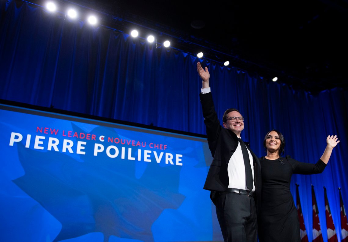 Conservative Party of Canada leader Pierre Poilievre and his wife Anaida wave on stage after he was announced as the winner of the Conservative Party of Canada leadership vote, in Ottawa, Ontario, on Saturday, Sept. 10, 2022. (Justin Tang/The Canadian Press via AP) Conservative Party of Canada leader Pierre Poilievre and his wife Anaida wave on stage after he was announced as the winner of the Conservative Party of Canada leadership vote, in Ottawa, Ontario, on Saturday, Sept. 10, 2022. (Justin Tang/The Canadian Press via AP)