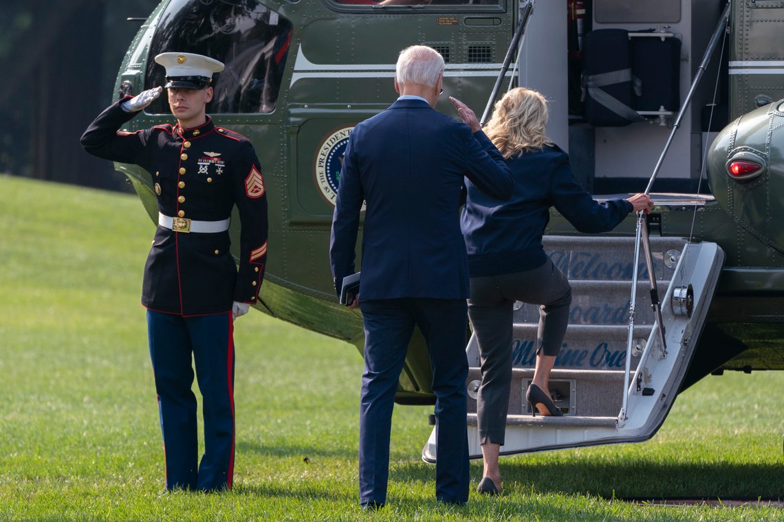 President Joe Biden returns a salute as he and first lady Jill Biden board Marine One on the South Lawn of the White House, Saturday, Sep. 17, 2022, in Washington, as they head to London to attend the funeral for Queen Elizabeth II. (AP Photo/Manuel Balce Ceneta) President Joe Biden returns a salute as he and first lady Jill Biden board Marine One on the South Lawn of the White House, Saturday, Sep. 17, 2022, in Washington, as they head to London to attend the funeral for Queen Elizabeth II. (AP Photo/Manuel Balce Ceneta)