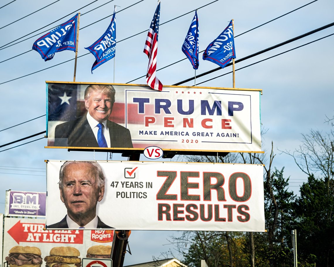 Shutterstock: Gainesville, USA - October 27, 2020: Donald Trump Mike Pence 2020 Make America Great Again billboard and Joe Biden 47 years in politics zero results sign at presidential election, Virginia. Contributor: Kristi Blokhin, United States. Shutterstock: Gainesville, USA - October 27, 2020: Donald Trump Mike Pence 2020 Make America Great Again billboard and Joe Biden 47 years in politics zero results sign at presidential election, Virginia. Contributor: Kristi Blokhin, United States.
