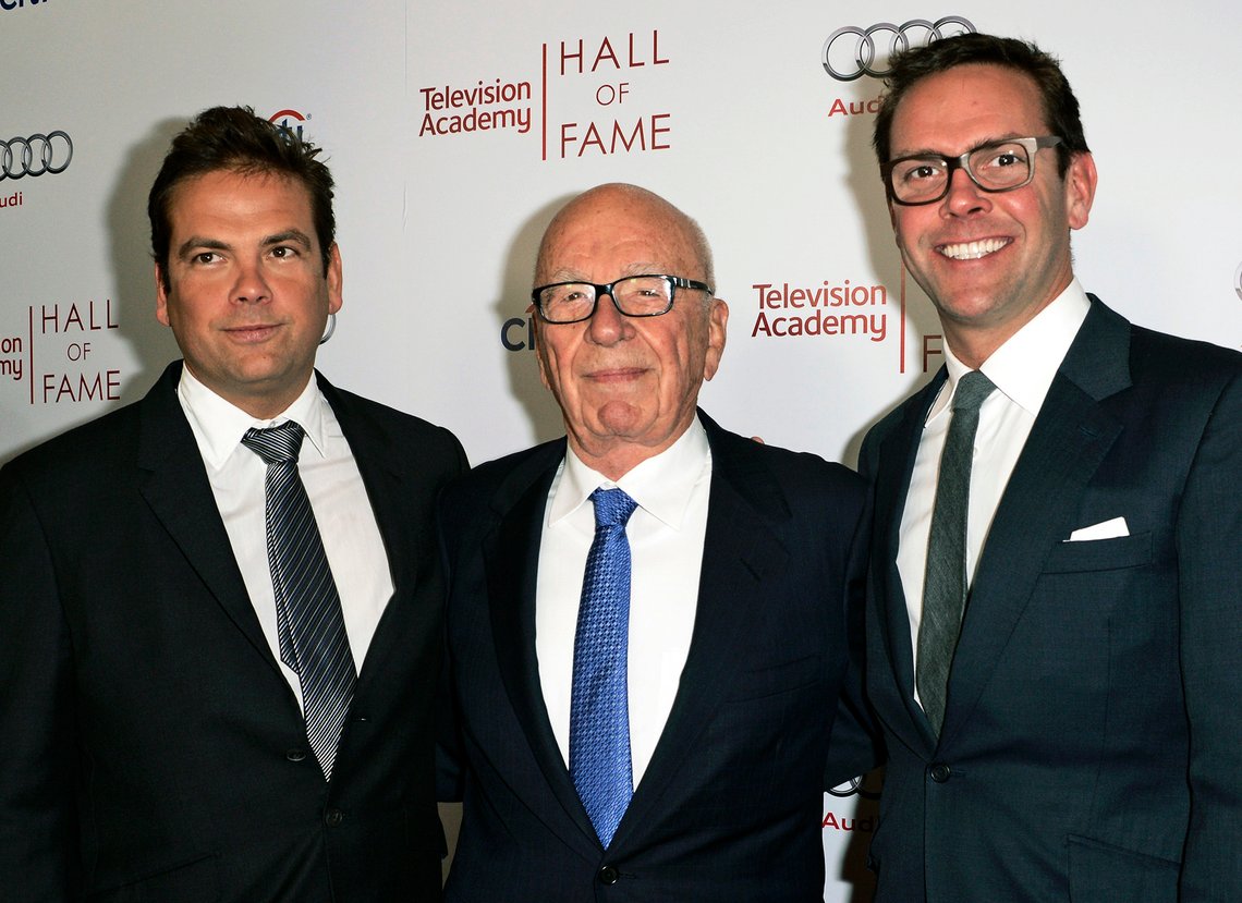 FILE - News Corp. Exeuctive Chairman Rupert Murdoch, center, and his sons, Lachlan, left, and James Murdoch attend the 2014 Television Academy Hall of Fame in Beverly Hills, Calif, March 11, 2014. Fox Corp. chief executive Lachlan Murdoch is suing Australian news website Crikey in a Sydney court for defamation over an opinion piece about last year's storming of the U.S. Capitol. (Photo by Dan Steinberg/Invision/AP Images, File) FILE - News Corp. Exeuctive Chairman Rupert Murdoch, center, and his sons, Lachlan, left, and James Murdoch attend the 2014 Television Academy Hall of Fame in Beverly Hills, Calif, March 11, 2014. Fox Corp. chief executive Lachlan Murdoch is suing Australian news website Crikey in a Sydney court for defamation over an opinion piece about last year's storming of the U.S. Capitol. (Photo by Dan Steinberg/Invision/AP Images, File)