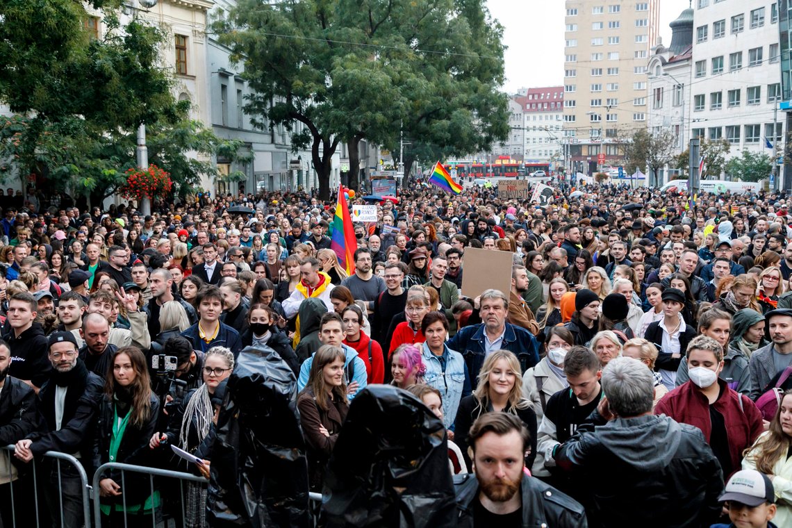 People gather to join a rally of thousands in Bratislava, Slovakia, Friday, Oct. 14, 2022, to honor two gay men who were shot dead in the capital earlier this week and demonstrate support for the LGBTQ community. (Dano Veselsky/TASR via AP) People gather to join a rally of thousands in Bratislava, Slovakia, Friday, Oct. 14, 2022, to honor two gay men who were shot dead in the capital earlier this week and demonstrate support for the LGBTQ community. (Dano Veselsky/TASR via AP)
