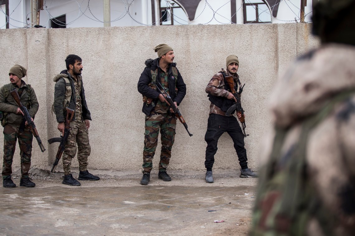 Syrian Democratic Forces soldiers hold a position in Hassakeh, northeast Syria, Thursday, Jan. 27, 2022. Dozens of armed Islamic State militants remained holed up in the last occupied section of a Syrian prison, U.S.-backed Kurdish-led forces said Thursday. The two sides clashed a day after the Syrian Democratic Forces announced they had regained full control of the facility. (AP Photo/Baderkhan Ahmad) Syrian Democratic Forces soldiers hold a position in Hassakeh, northeast Syria, Thursday, Jan. 27, 2022. Dozens of armed Islamic State militants remained holed up in the last occupied section of a Syrian prison, U.S.-backed Kurdish-led forces said Thursday. The two sides clashed a day after the Syrian Democratic Forces announced they had regained full control of the facility. (AP Photo/Baderkhan Ahmad)