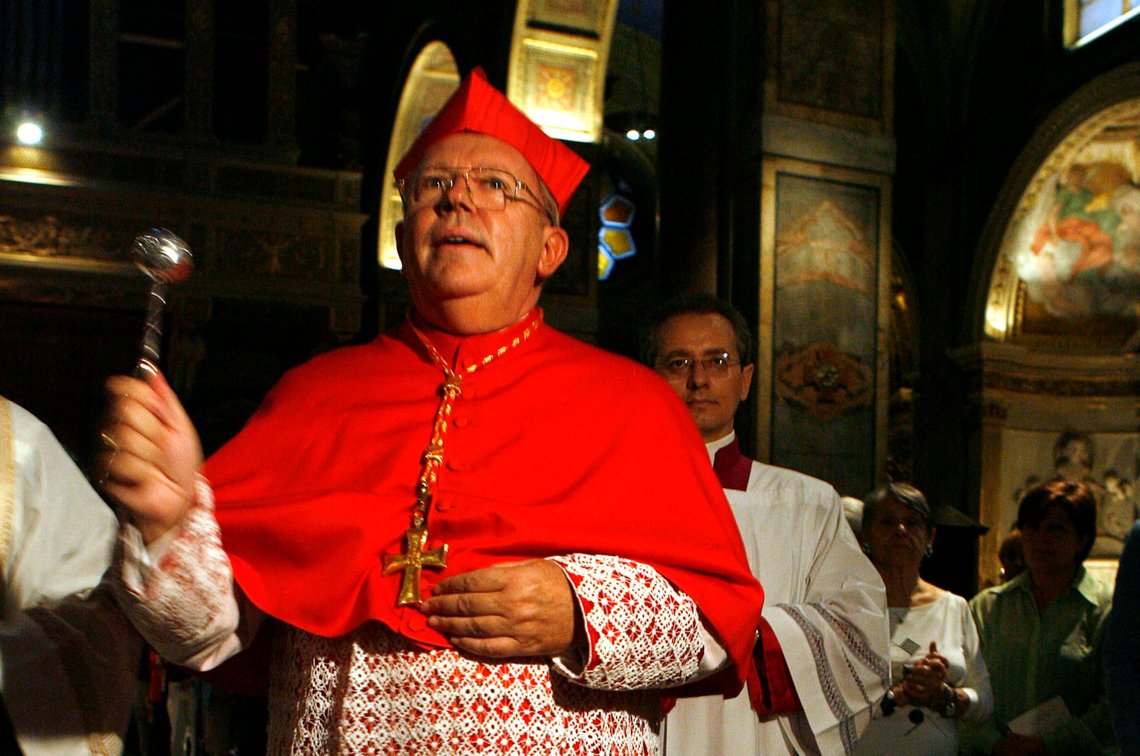 FILE - Archbishop of Bordeaux, France, Cardinal Jean-Pierre Bernard Ricard blesses his titular church - Sant' Agostino - during a ceremony to officially take possession of his church, in Rome, Sunday, Oct. 8, 2006. Cardinal Jean-Pierre Ricard said on Monday Nov.7, 2022 that he had abused a 14-year-old girl thirty-five years ago and is withdrawing from his functions. The move comes after a report issued last year revealed a large number of child sex abuse cases within the country's Catholic Church. (AP Photo/Andrew Medichini, File) FILE - Archbishop of Bordeaux, France, Cardinal Jean-Pierre Bernard Ricard blesses his titular church - Sant' Agostino - during a ceremony to officially take possession of his church, in Rome, Sunday, Oct. 8, 2006. Cardinal Jean-Pierre Ricard said on Monday Nov.7, 2022 that he had abused a 14-year-old girl thirty-five years ago and is withdrawing from his functions. The move comes after a report issued last year revealed a large number of child sex abuse cases within the country's Catholic Church. (AP Photo/Andrew Medichini, File)